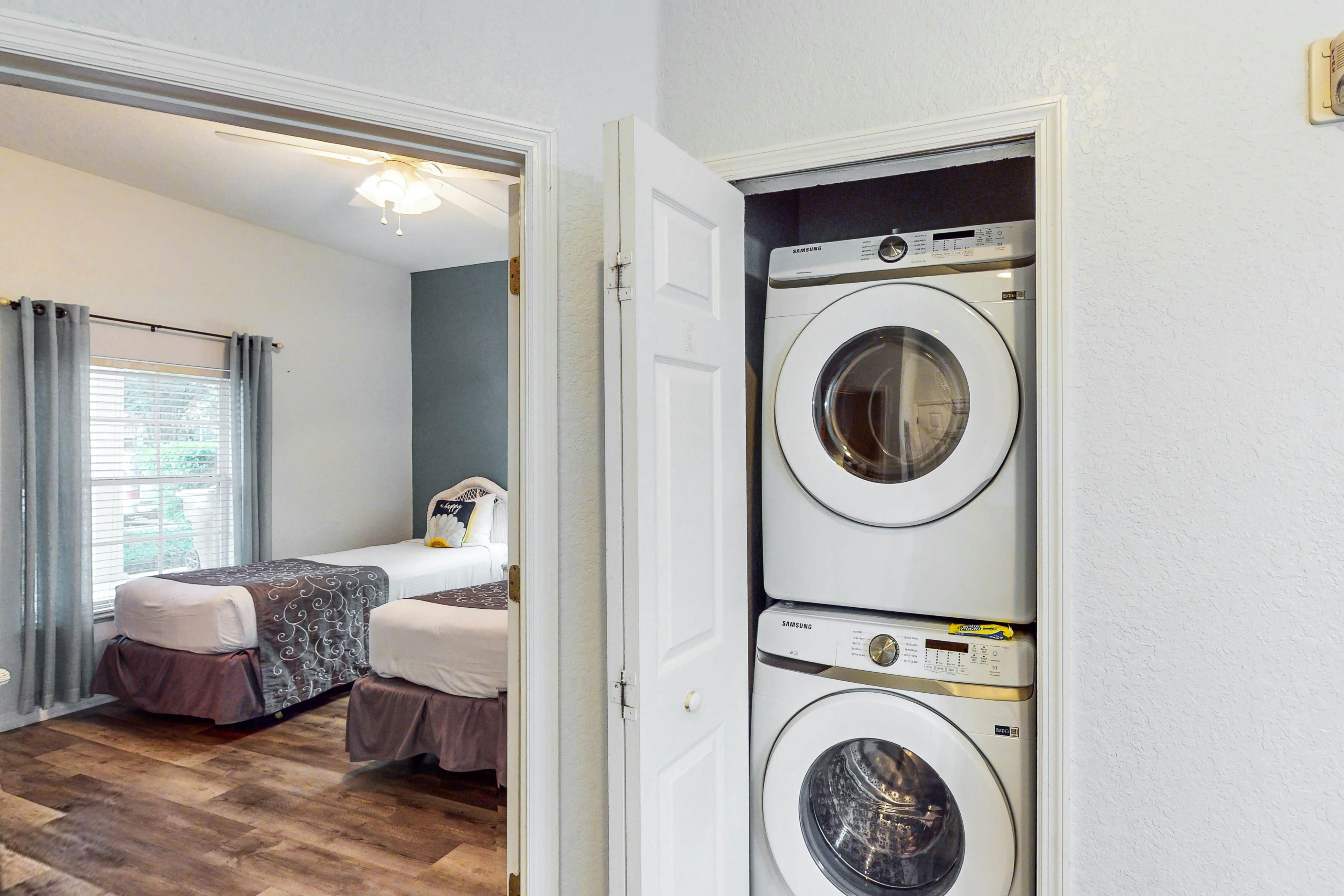 First floor lake view condo w/ pool & hot tub access, private W/D, & central AC