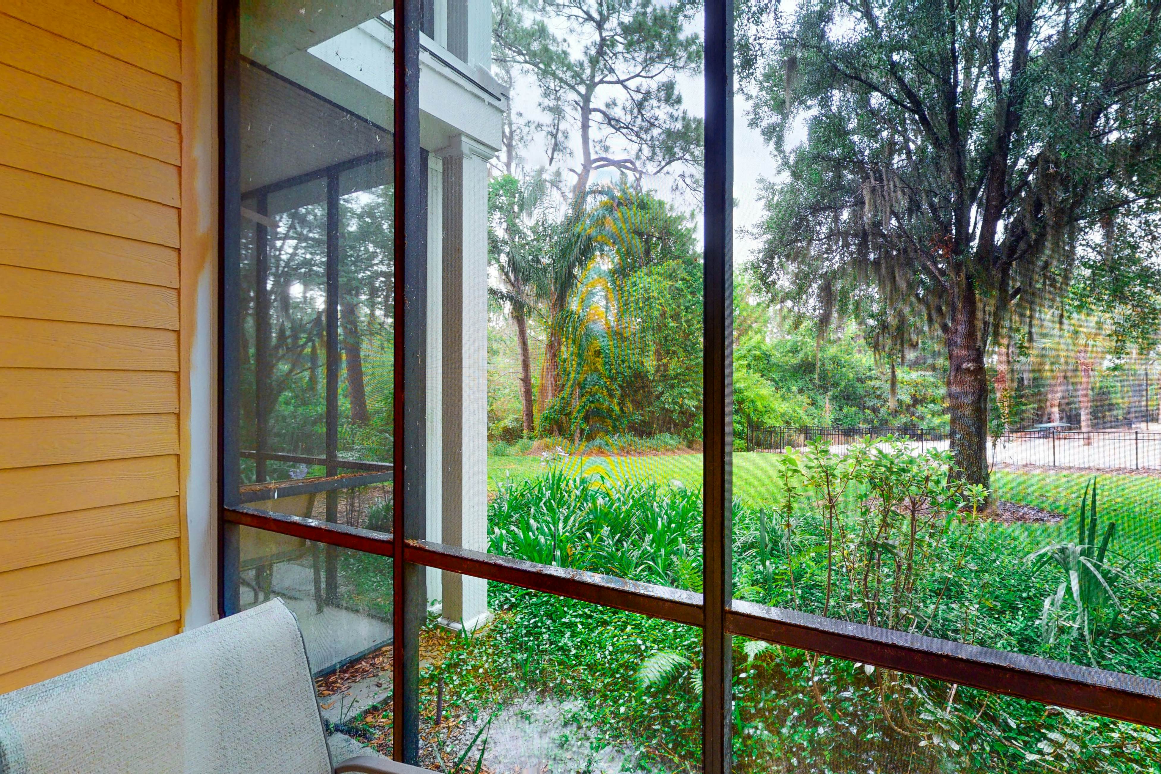 First floor lake view condo w/ pool & hot tub access, private W/D, & central AC