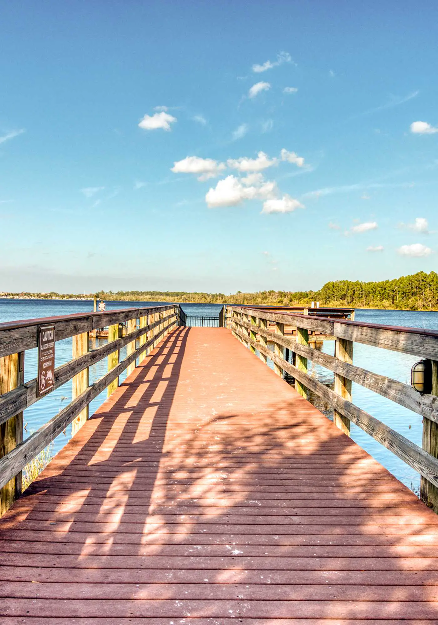 First floor lake view condo w/ pool & hot tub access, private W/D, & central AC