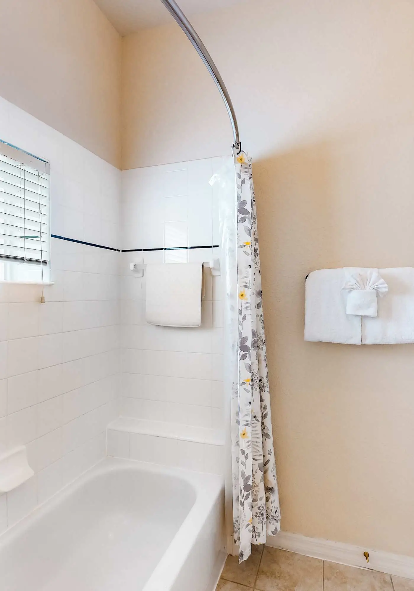 First floor lake view condo w/ pool & hot tub access, private W/D, & central AC