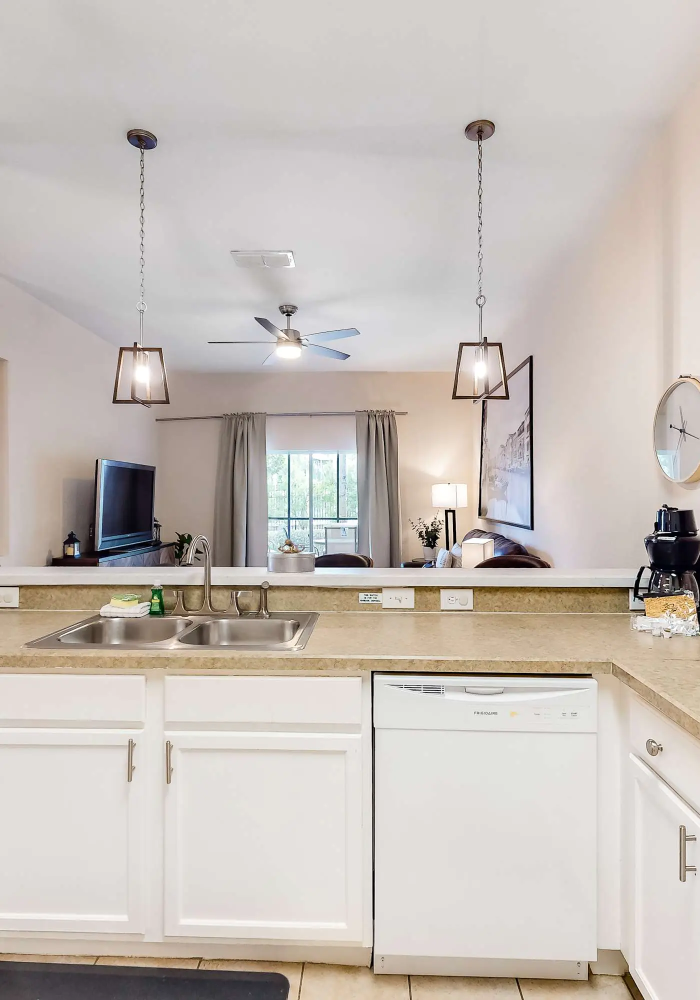 First floor lake view condo w/ pool & hot tub access, private W/D, & central AC