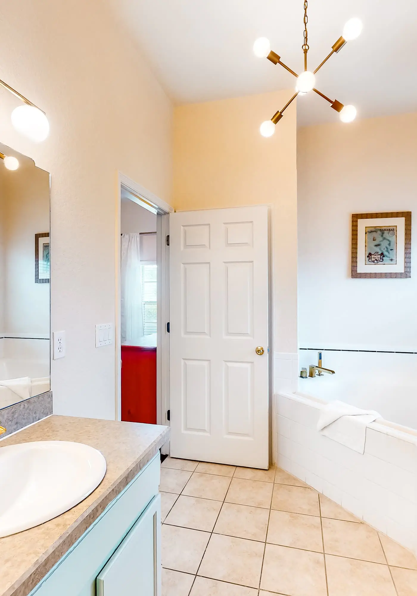 First floor lake view condo w/ pool & hot tub access, private W/D, & central AC