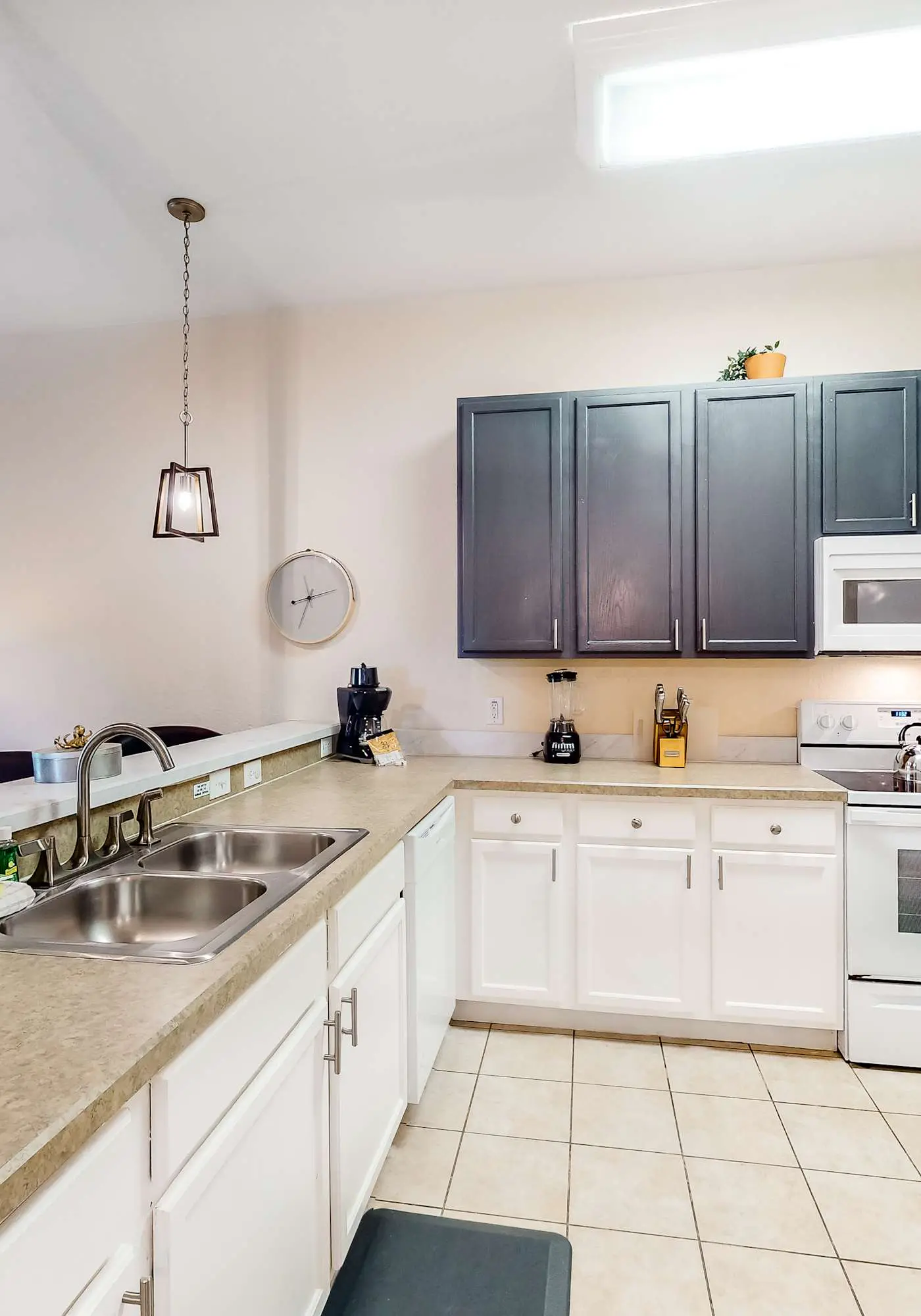 First floor lake view condo w/ pool & hot tub access, private W/D, & central AC