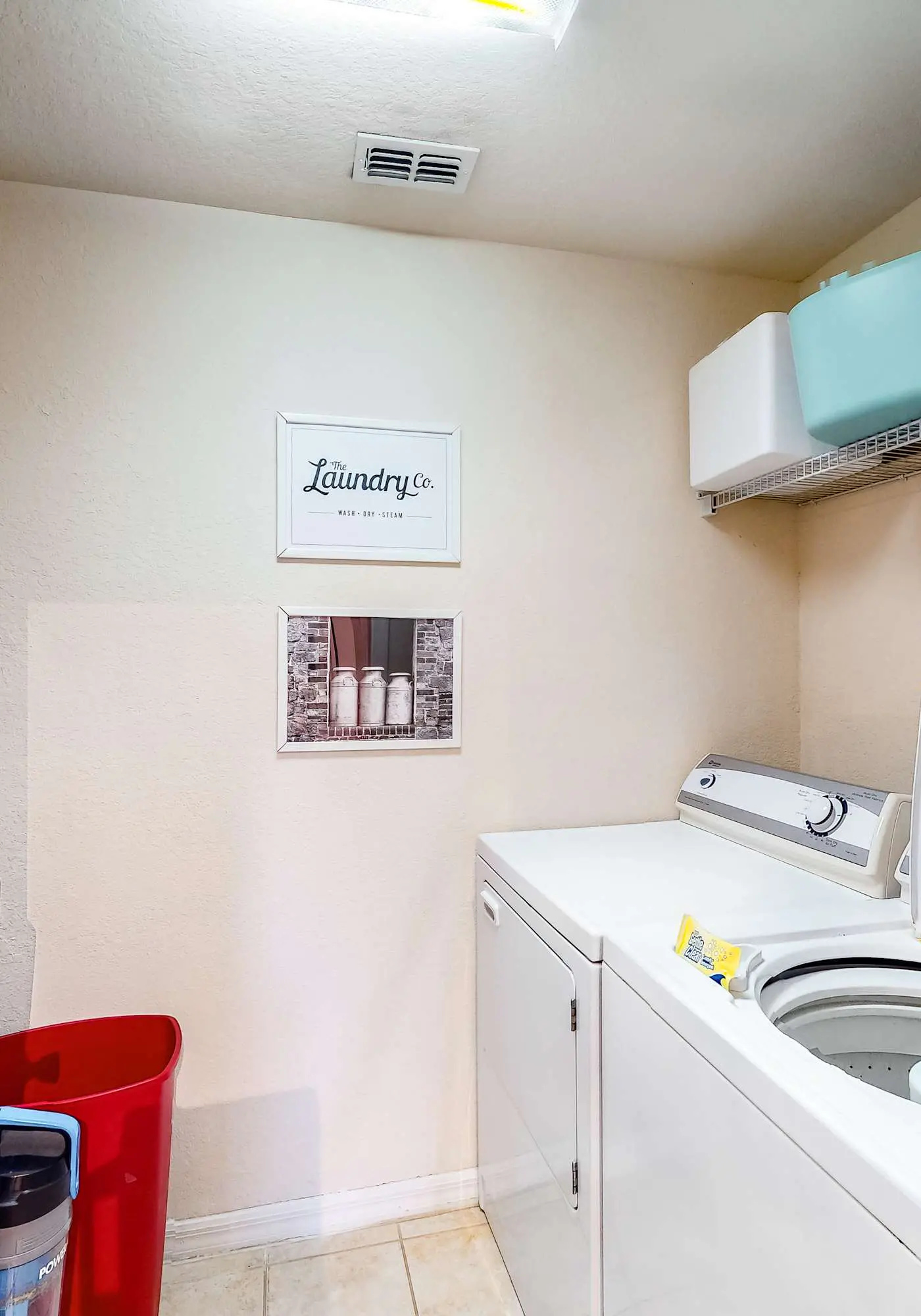 First floor lake view condo w/ pool & hot tub access, private W/D, & central AC