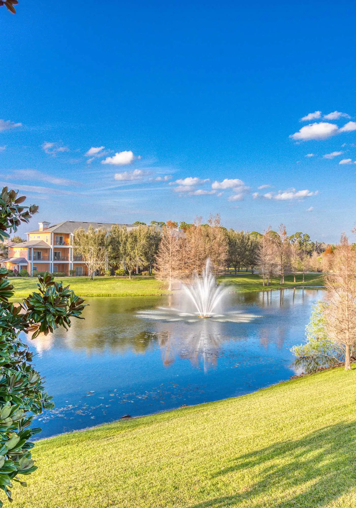 First floor lake view condo w/ pool & hot tub access, private W/D, & central AC
