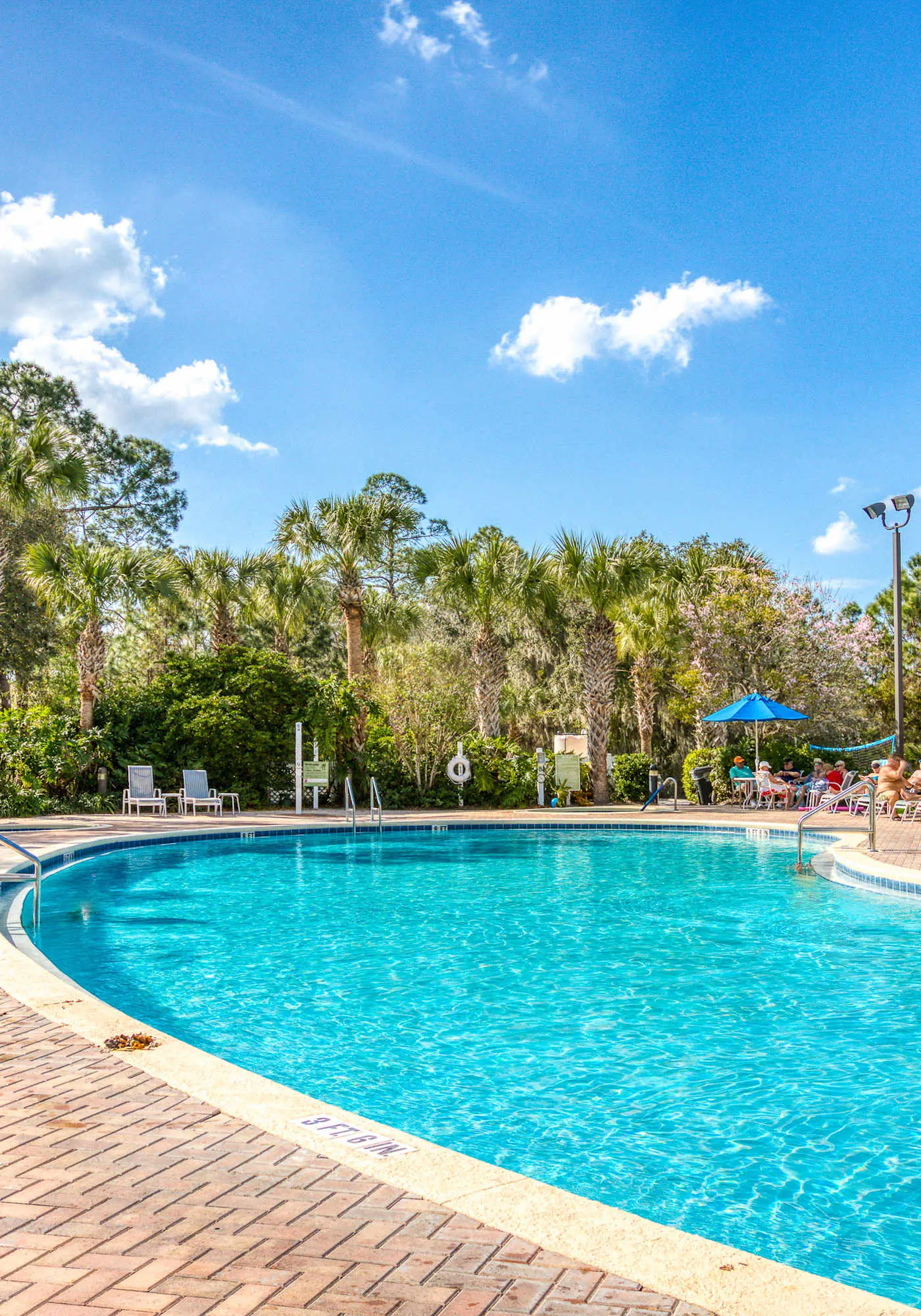 First floor lake view condo w/ pool & hot tub access, private W/D, & central AC