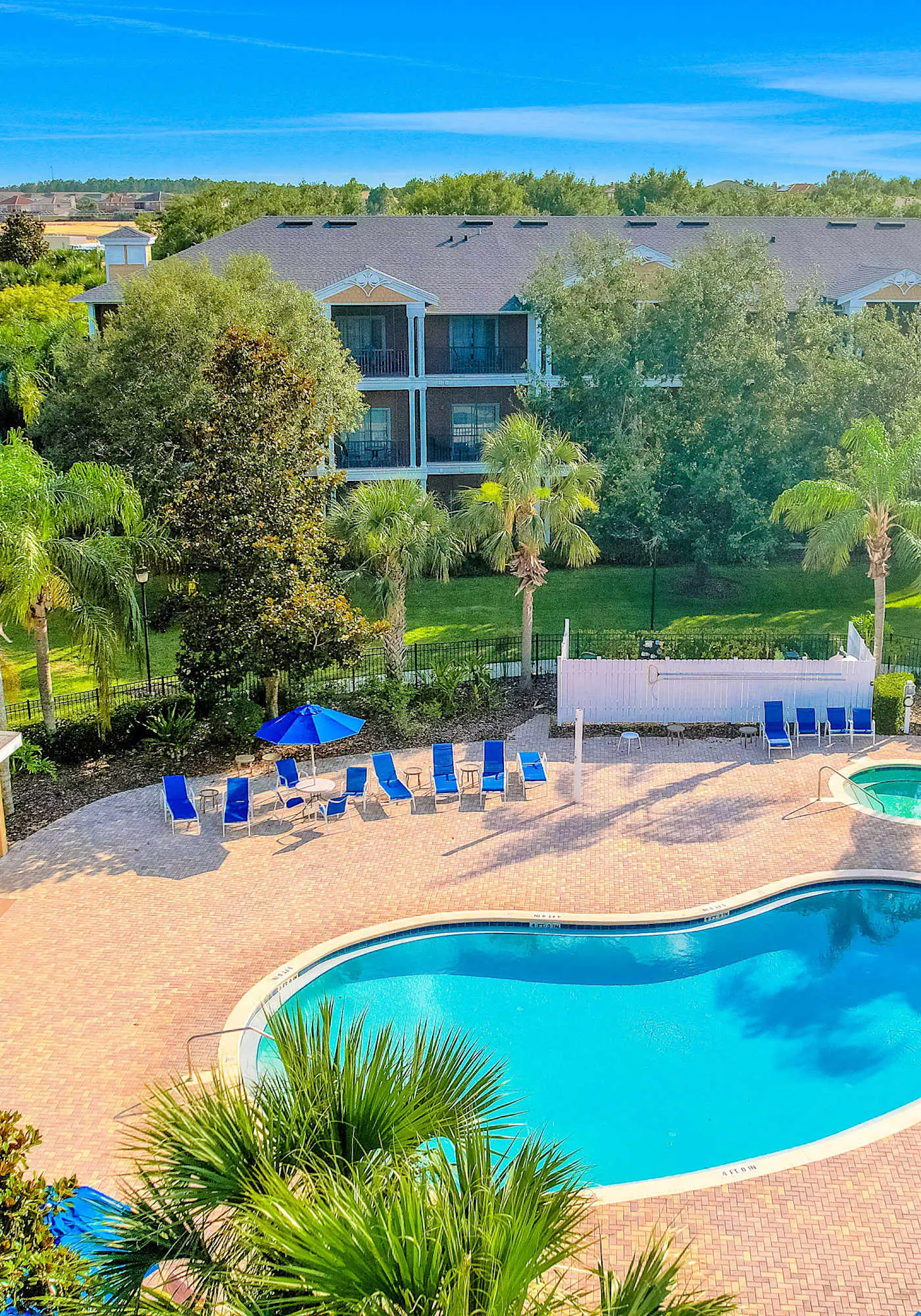 First floor lake view condo w/ pool & hot tub access, private W/D, & central AC