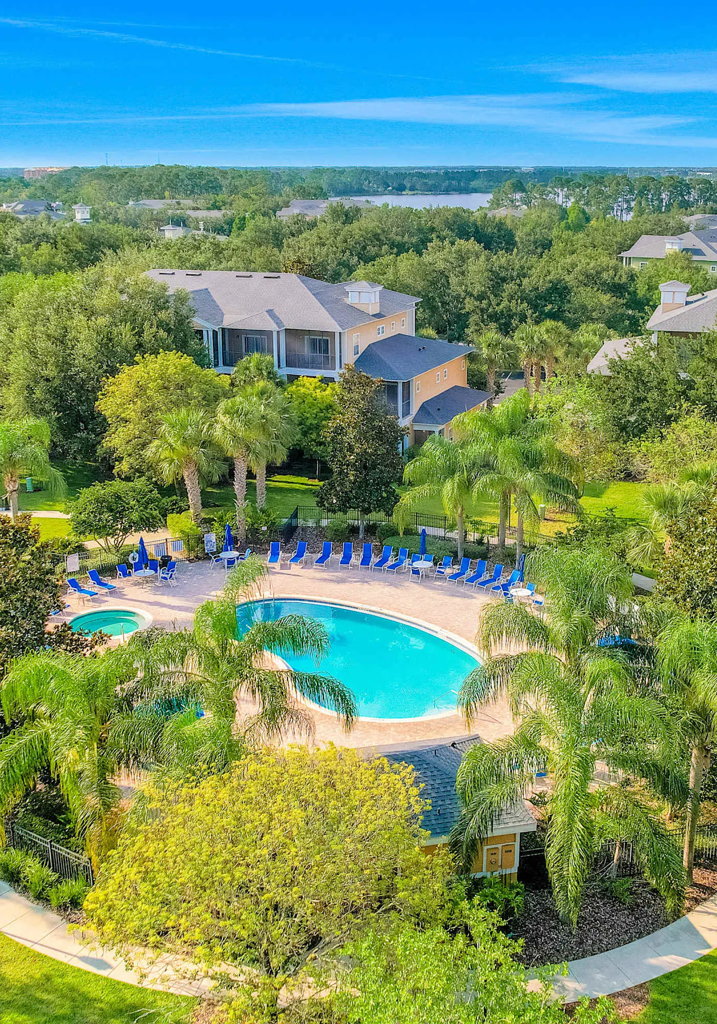 First floor lake view condo w/ pool & hot tub access, private W/D, & central AC