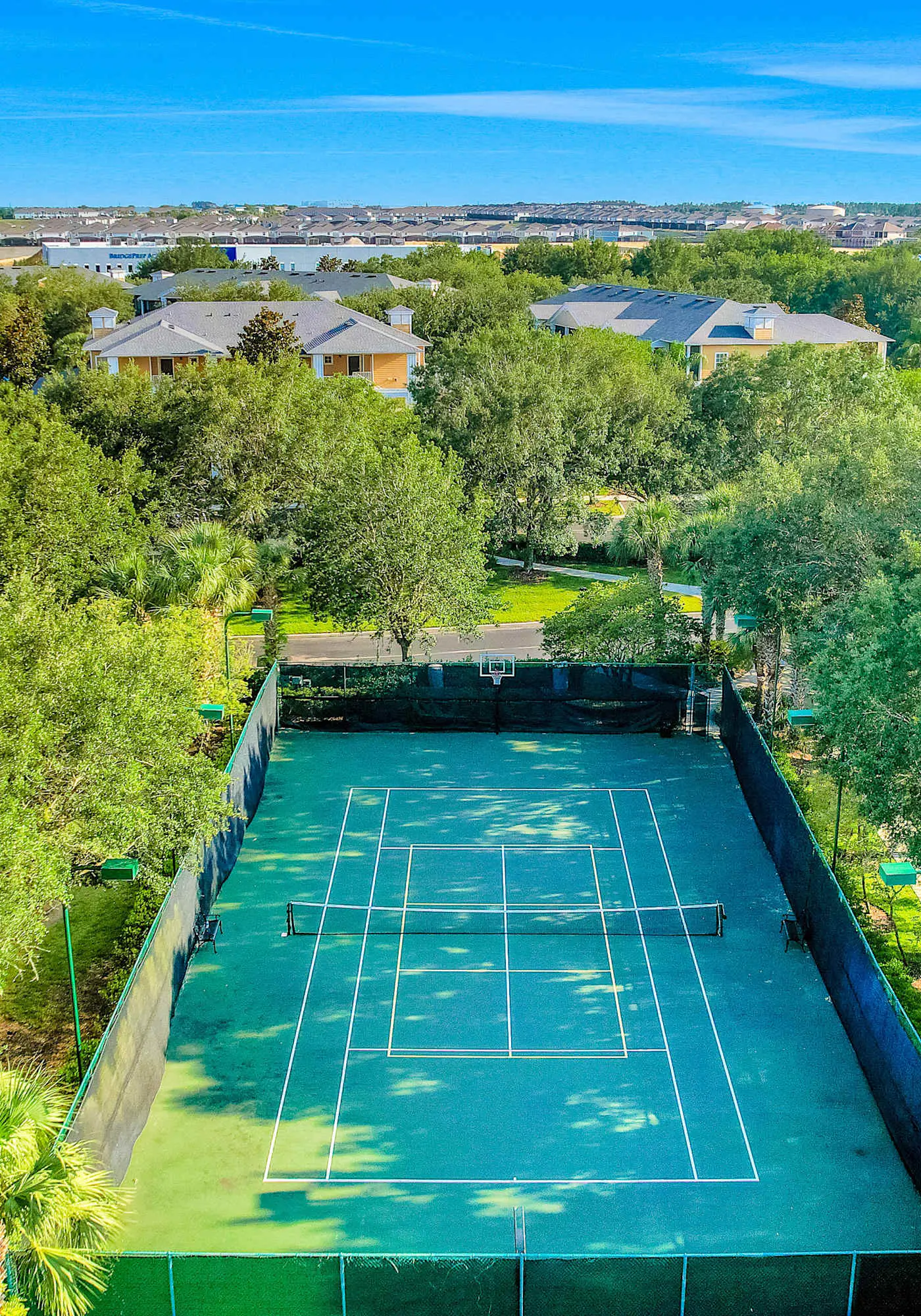 First floor lake view condo w/ pool & hot tub access, private W/D, & central AC