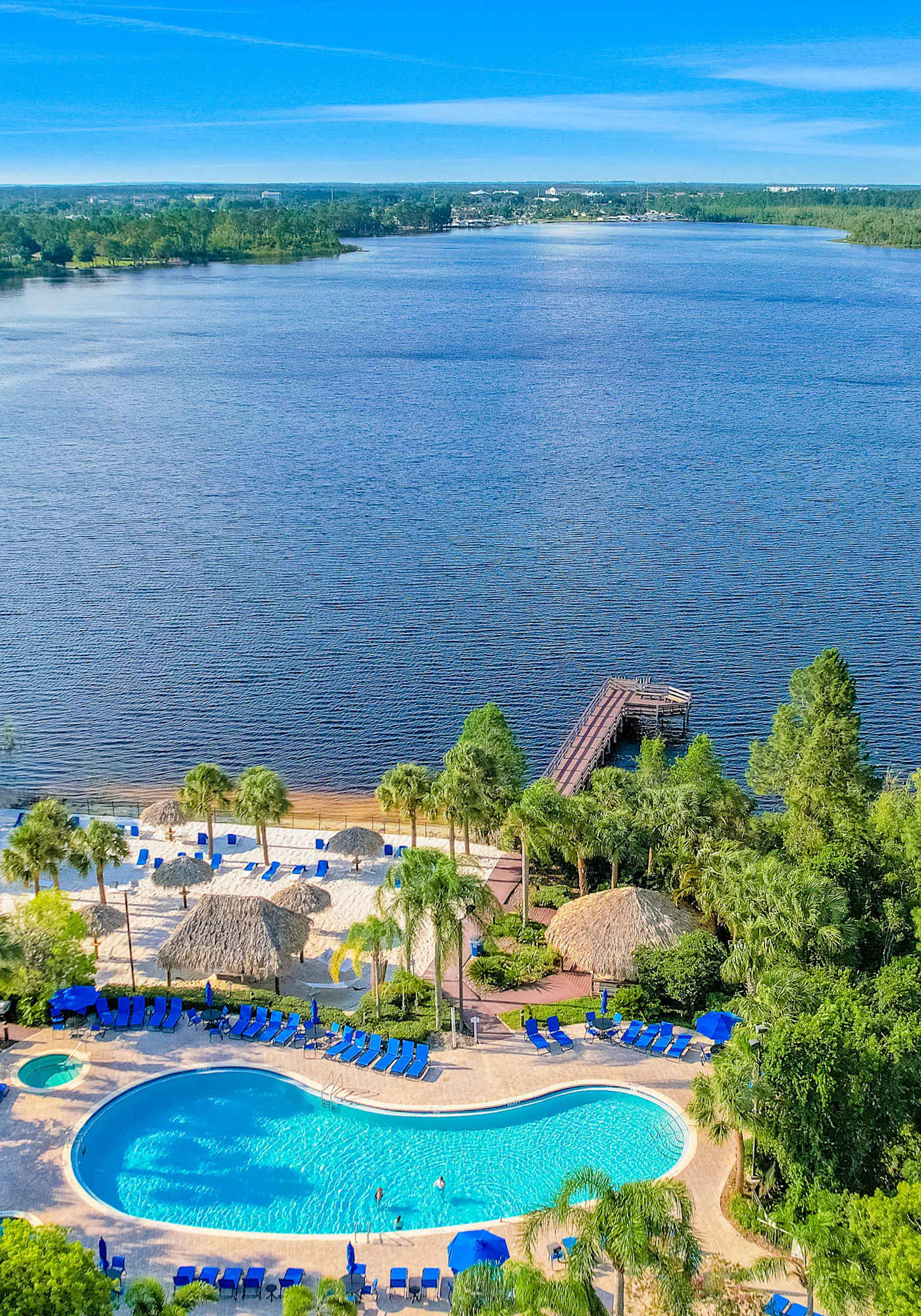 First floor lake view condo w/ pool & hot tub access, private W/D, & central AC