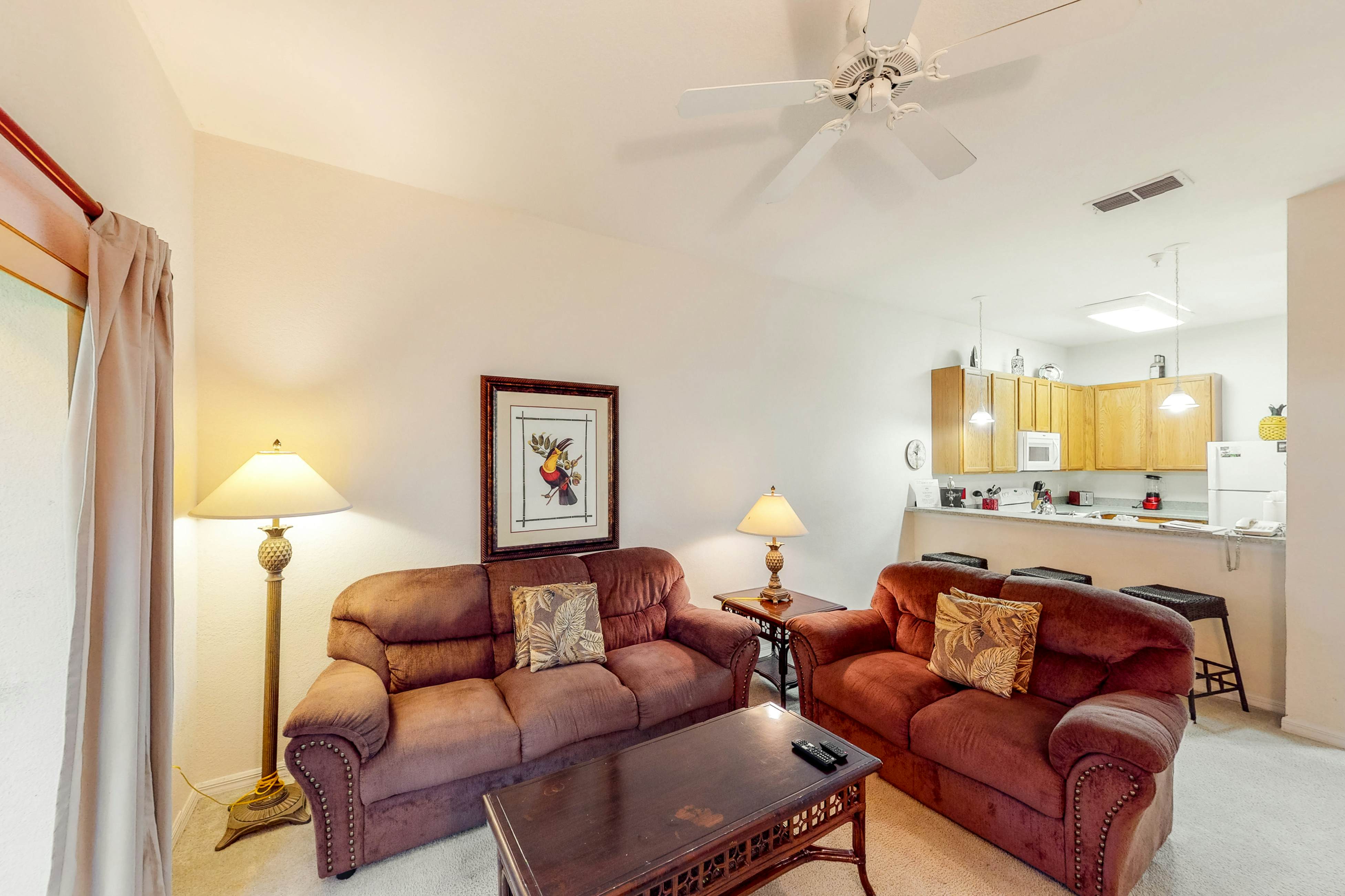 Welcoming ground-floor condo with patio, pool, fitness center, sauna, & hot tub