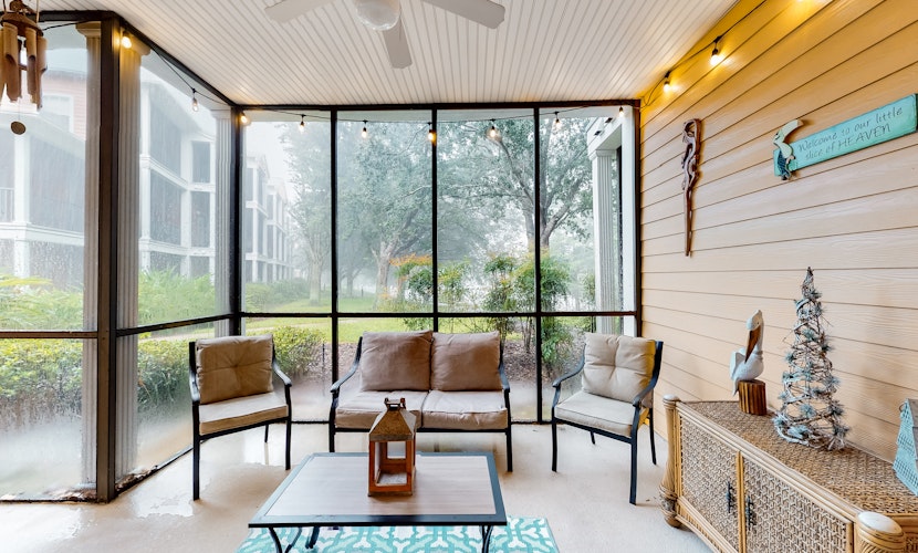 Inviting ground-floor condo with homey ambience, water view, & resort amenities