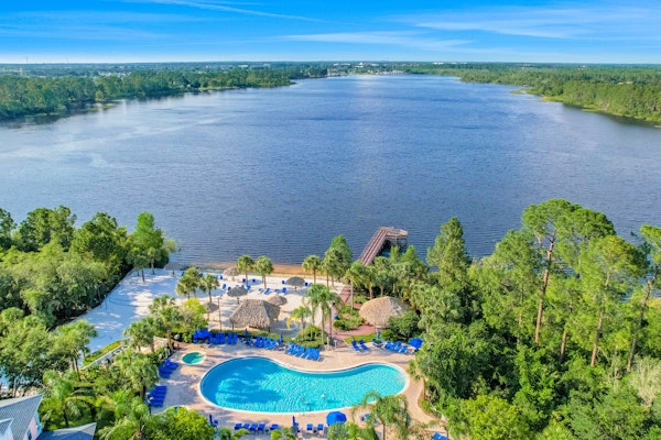 Inviting ground-floor condo with homey ambience, water view, & resort amenities