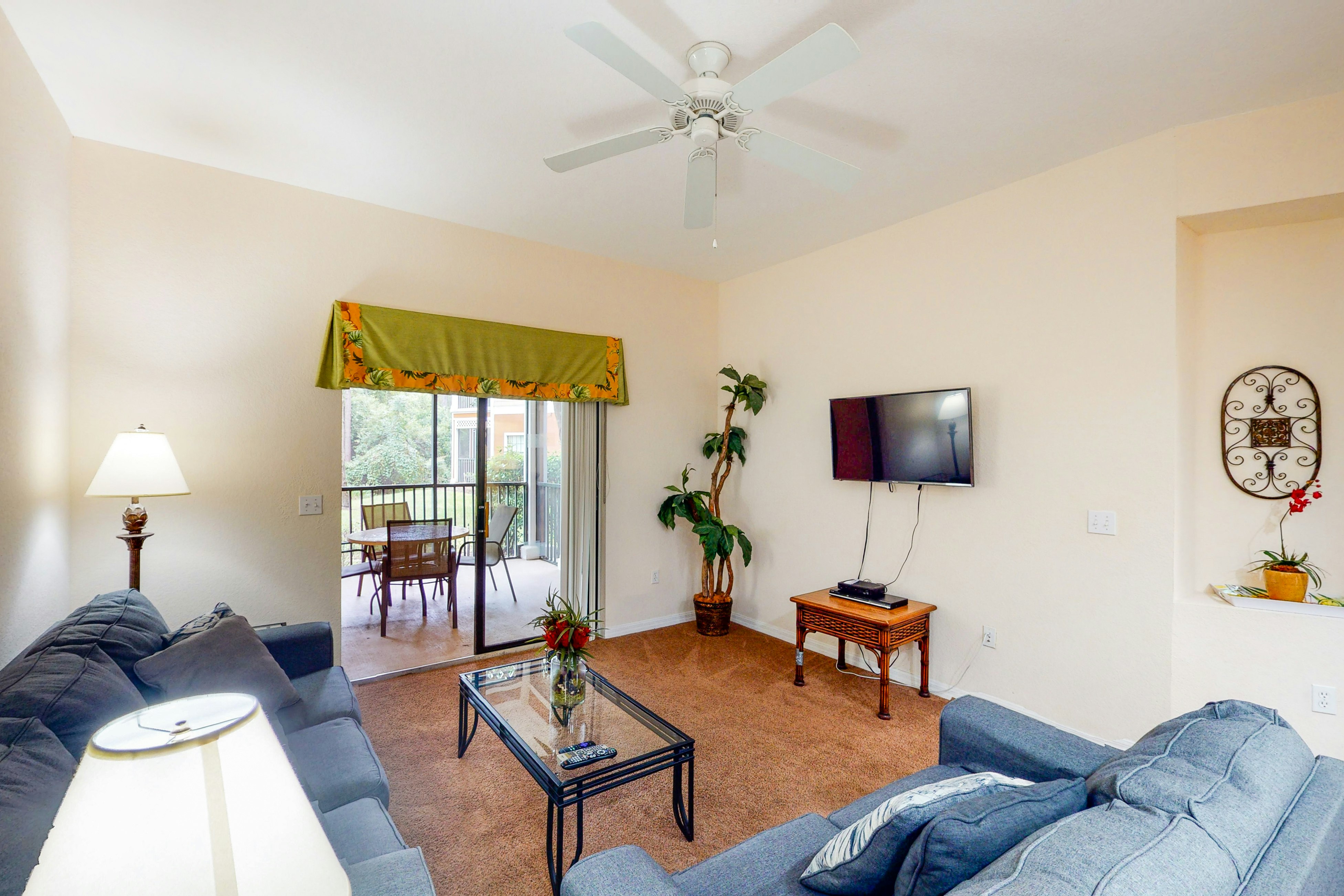 1st floor condo w/ sauna, shared pools, patio, limited-mobility access, gym