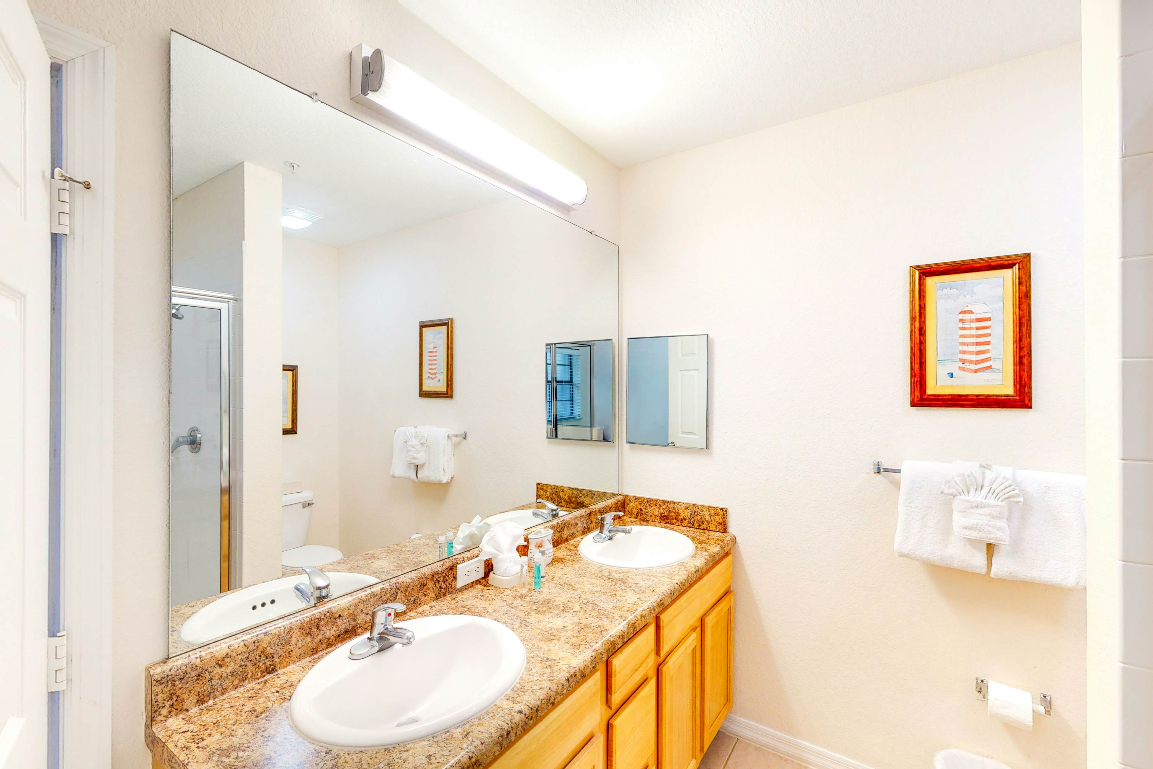 1st floor condo w/ sauna, shared pools, patio, limited-mobility access, gym