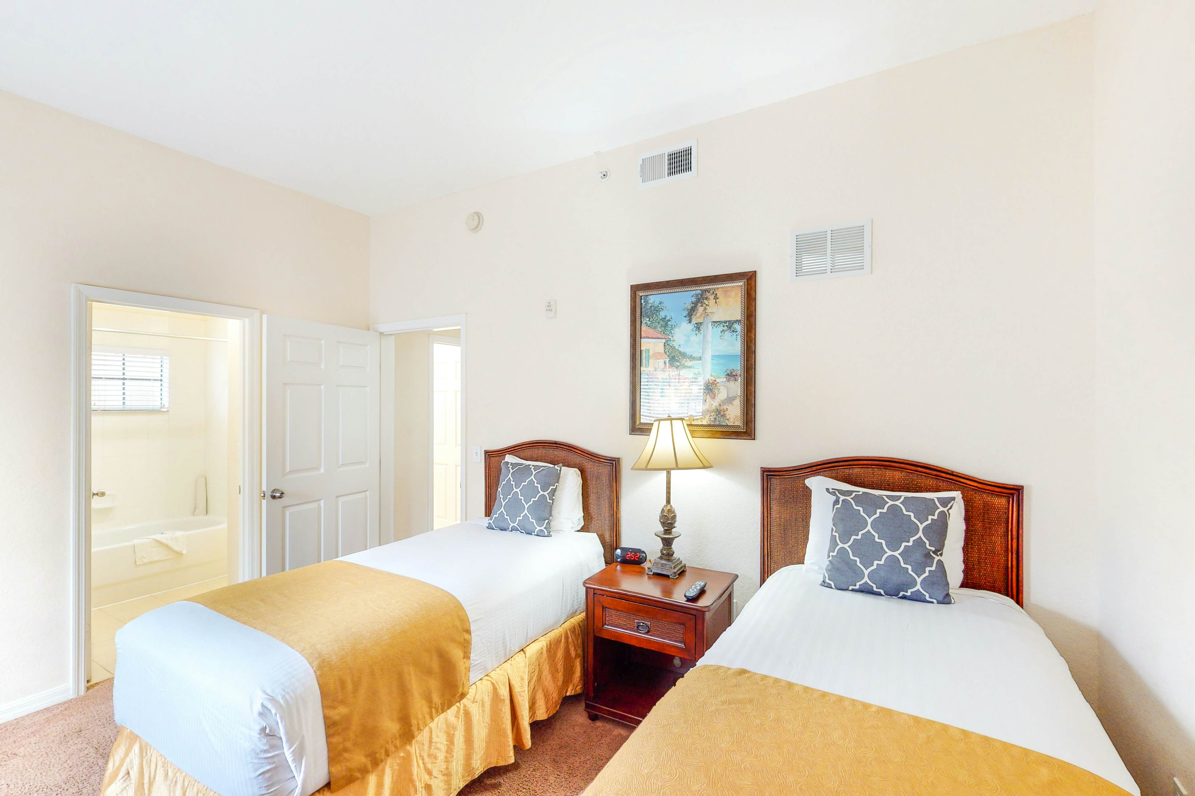 1st floor condo w/ sauna, shared pools, patio, limited-mobility access, gym