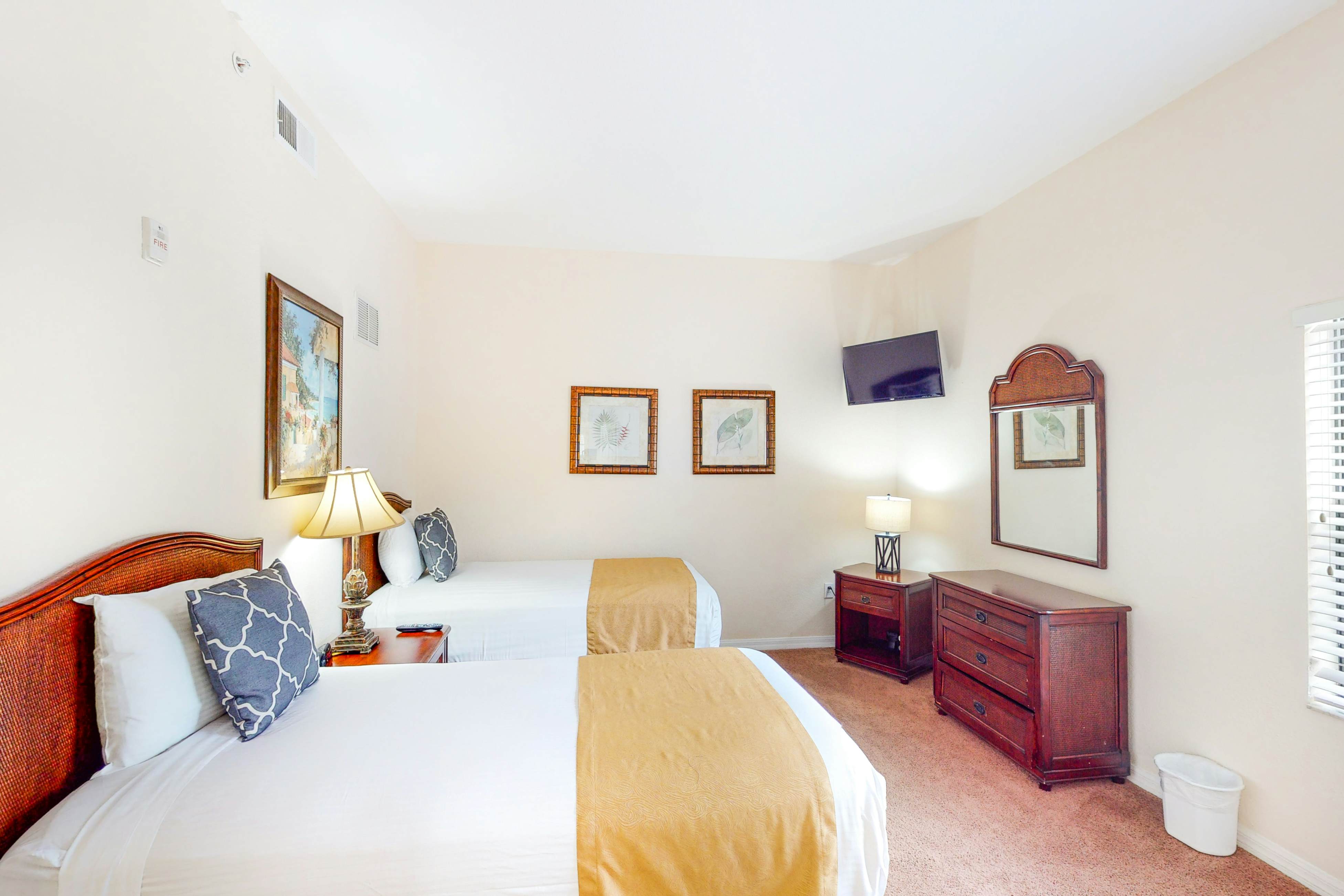 1st floor condo w/ sauna, shared pools, patio, limited-mobility access, gym