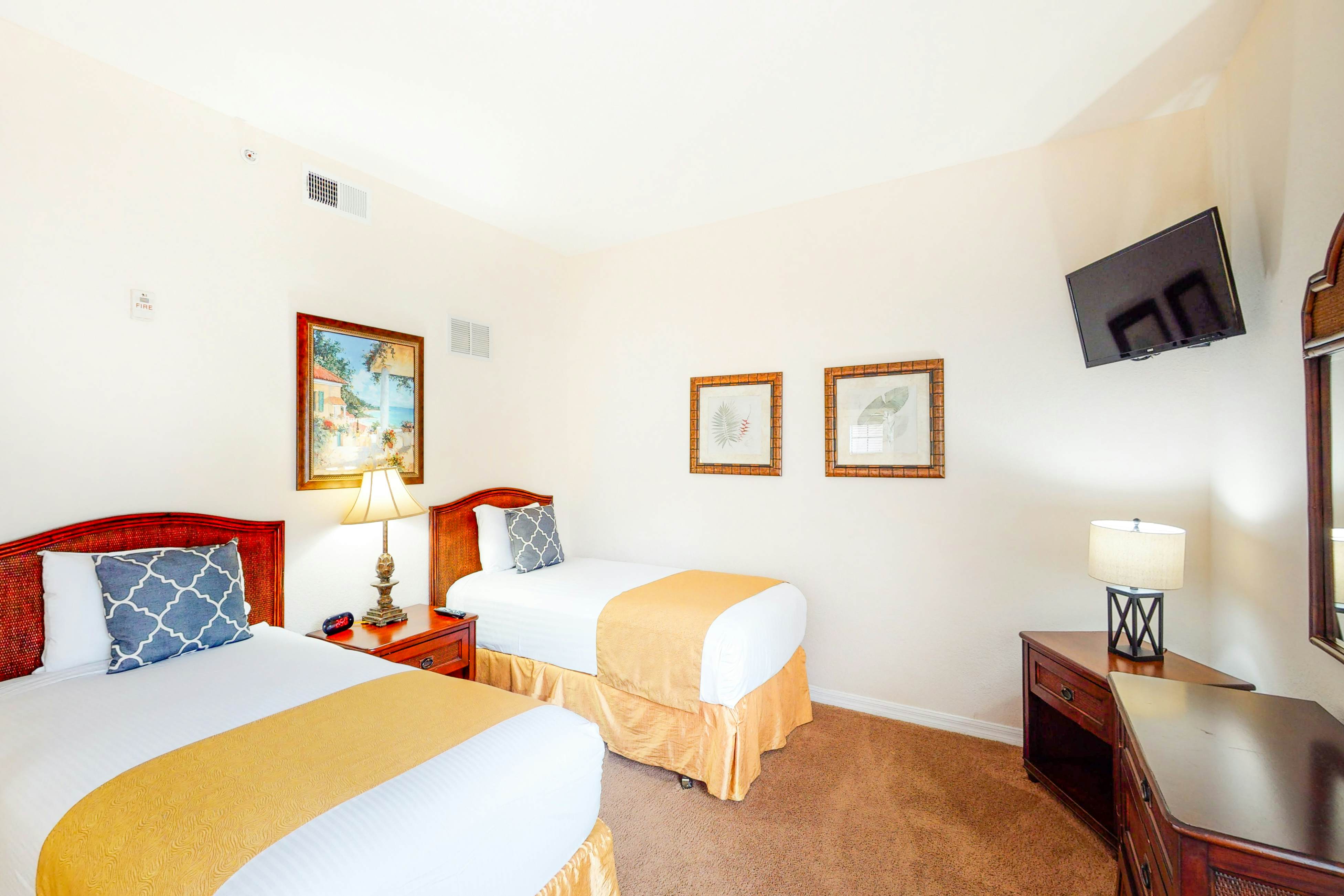 1st floor condo w/ sauna, shared pools, patio, limited-mobility access, gym