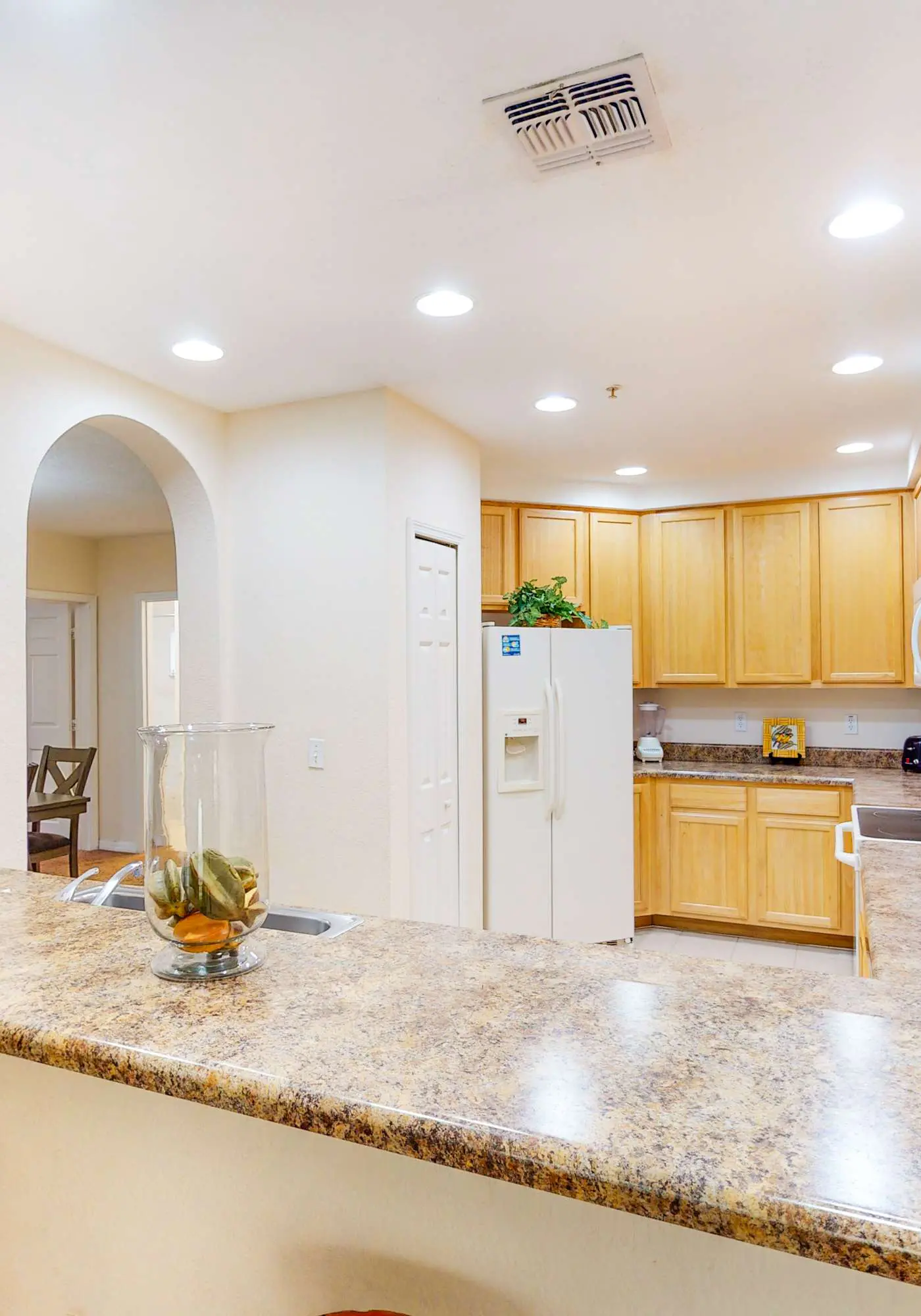 1st floor condo w/ sauna, shared pools, patio, limited-mobility access, gym