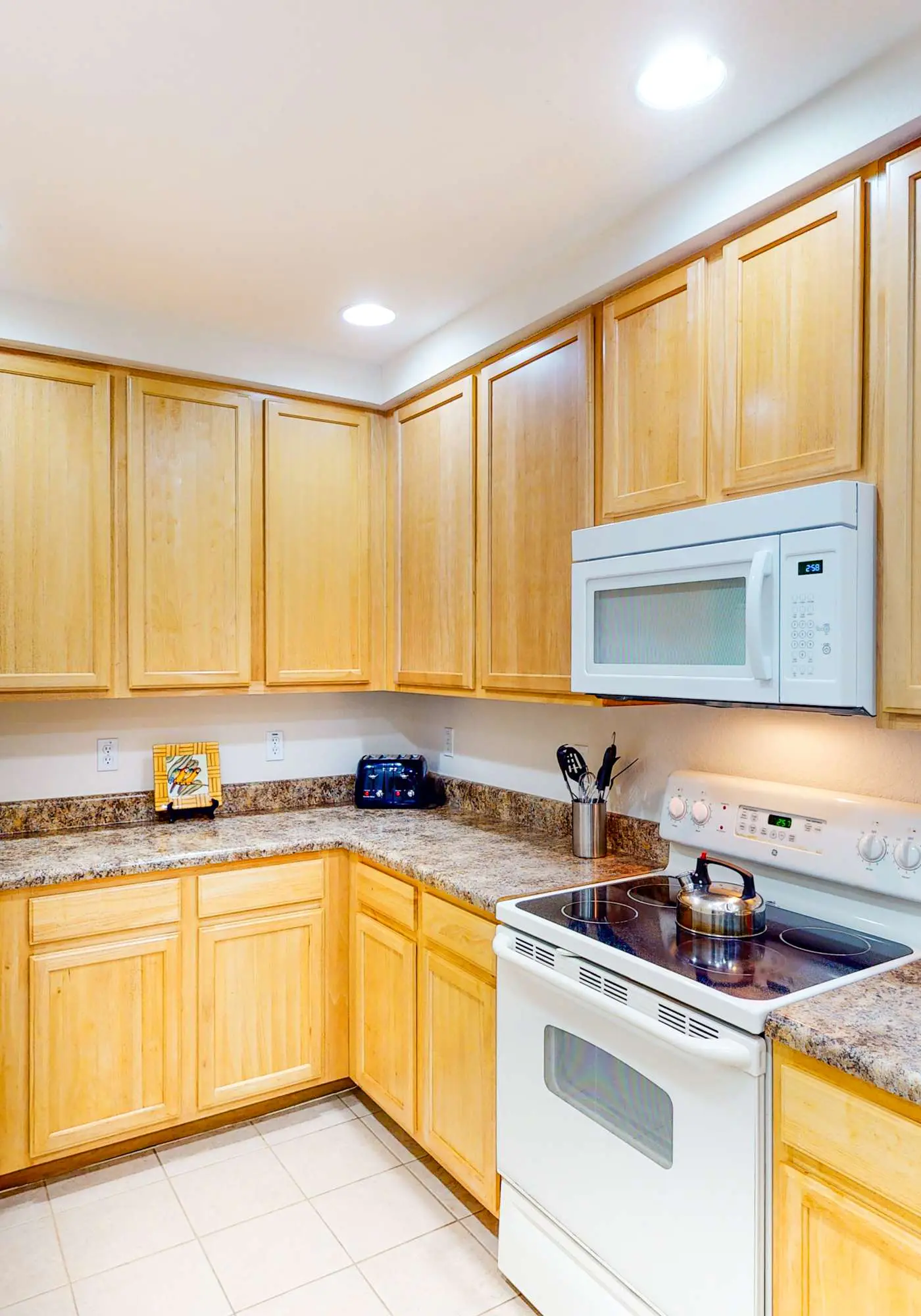 1st floor condo w/ sauna, shared pools, patio, limited-mobility access, gym