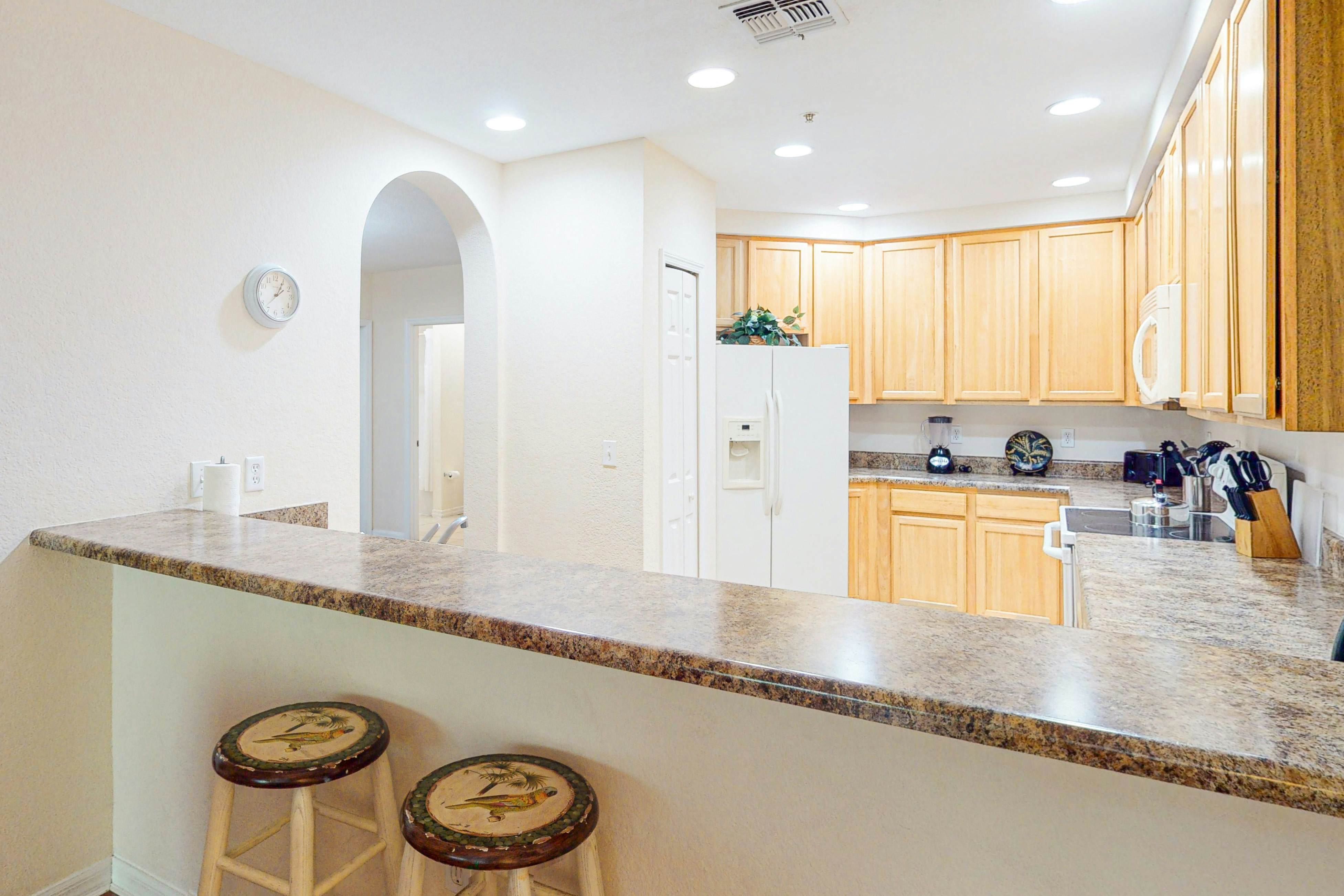 1st floor condo w/ patio, shared pools, gym, limited-mobility access, & sauna