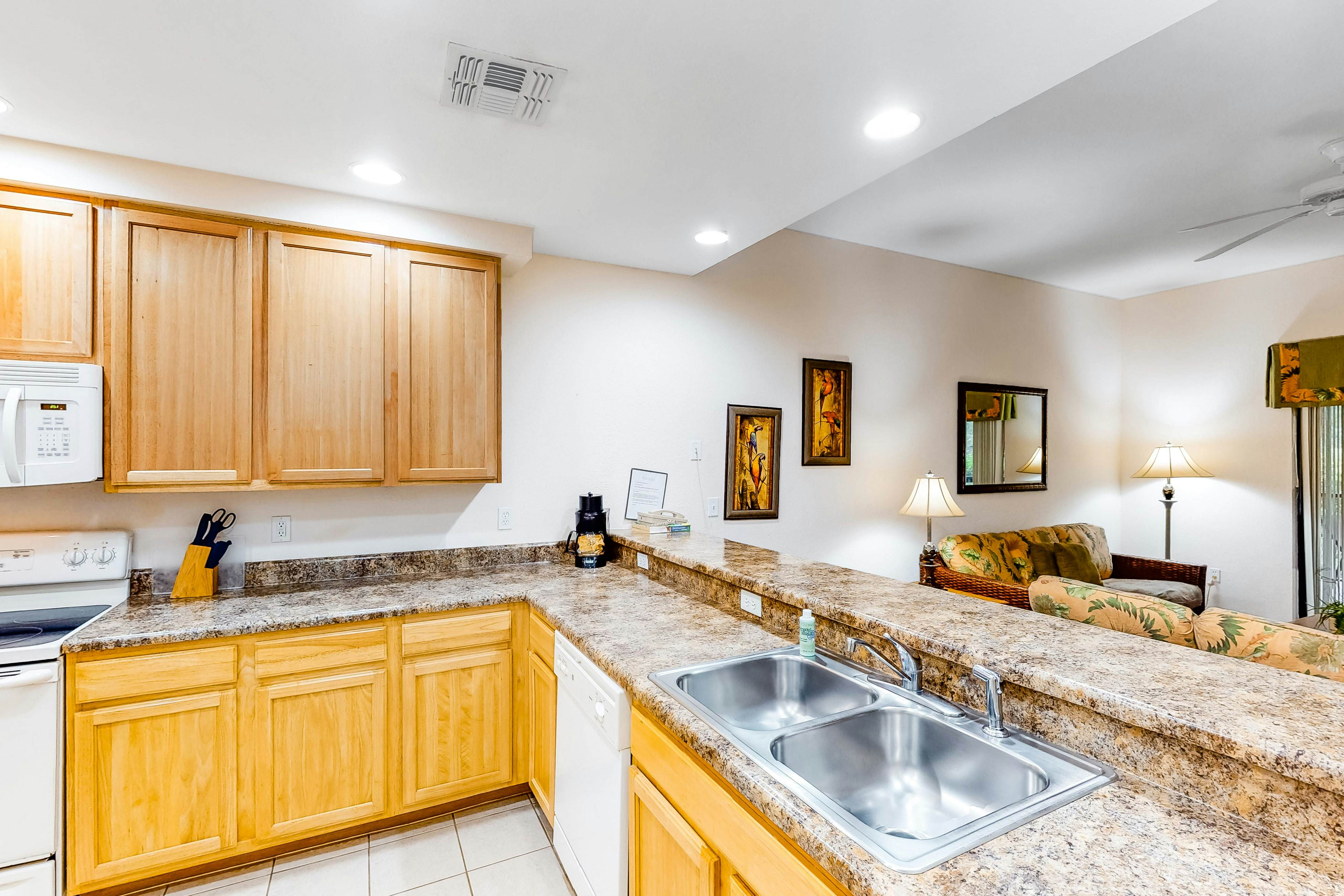 1st floor condo w/ patio, shared pools, gym, limited-mobility access, & sauna