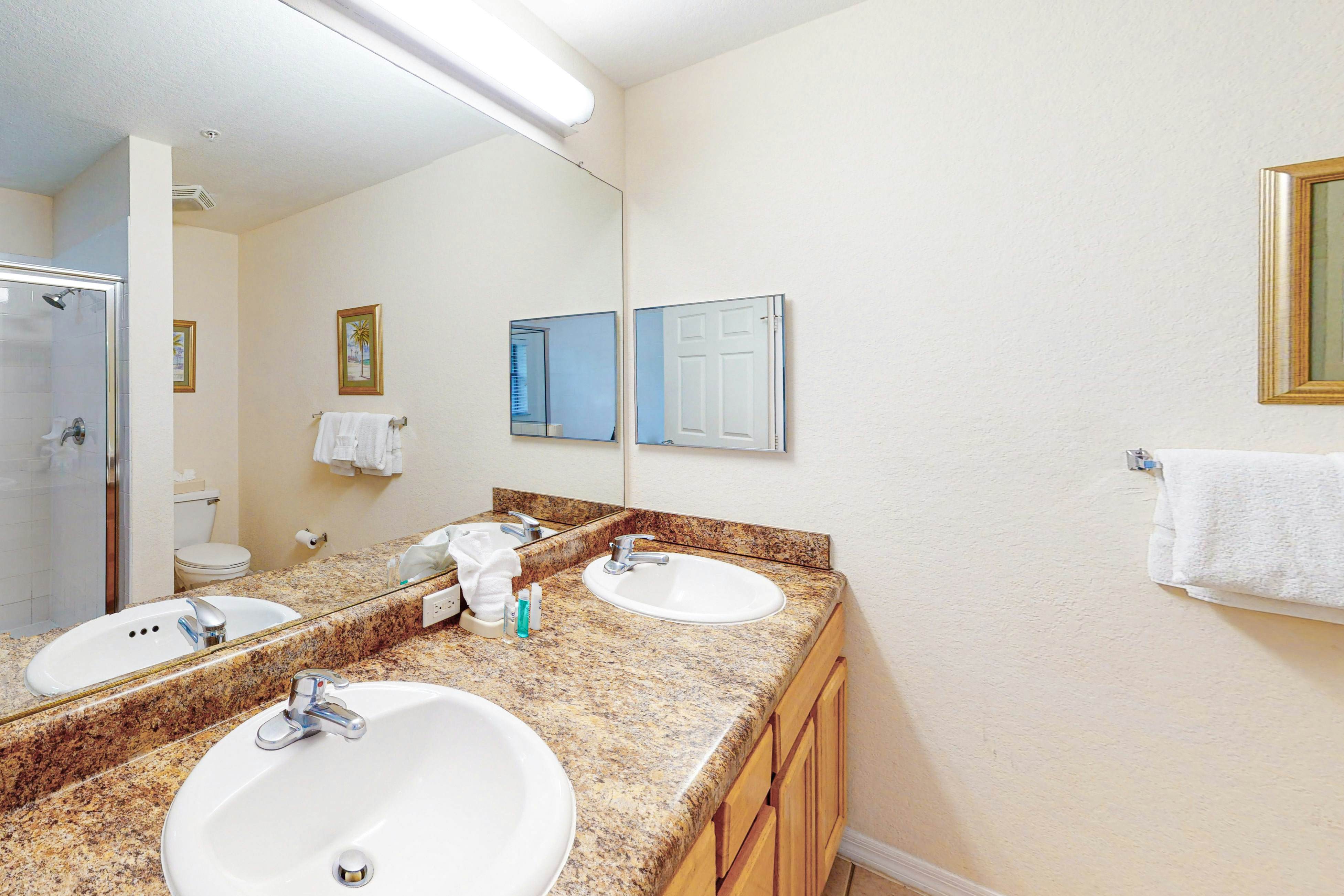 1st floor condo w/ patio, shared pools, gym, limited-mobility access, & sauna