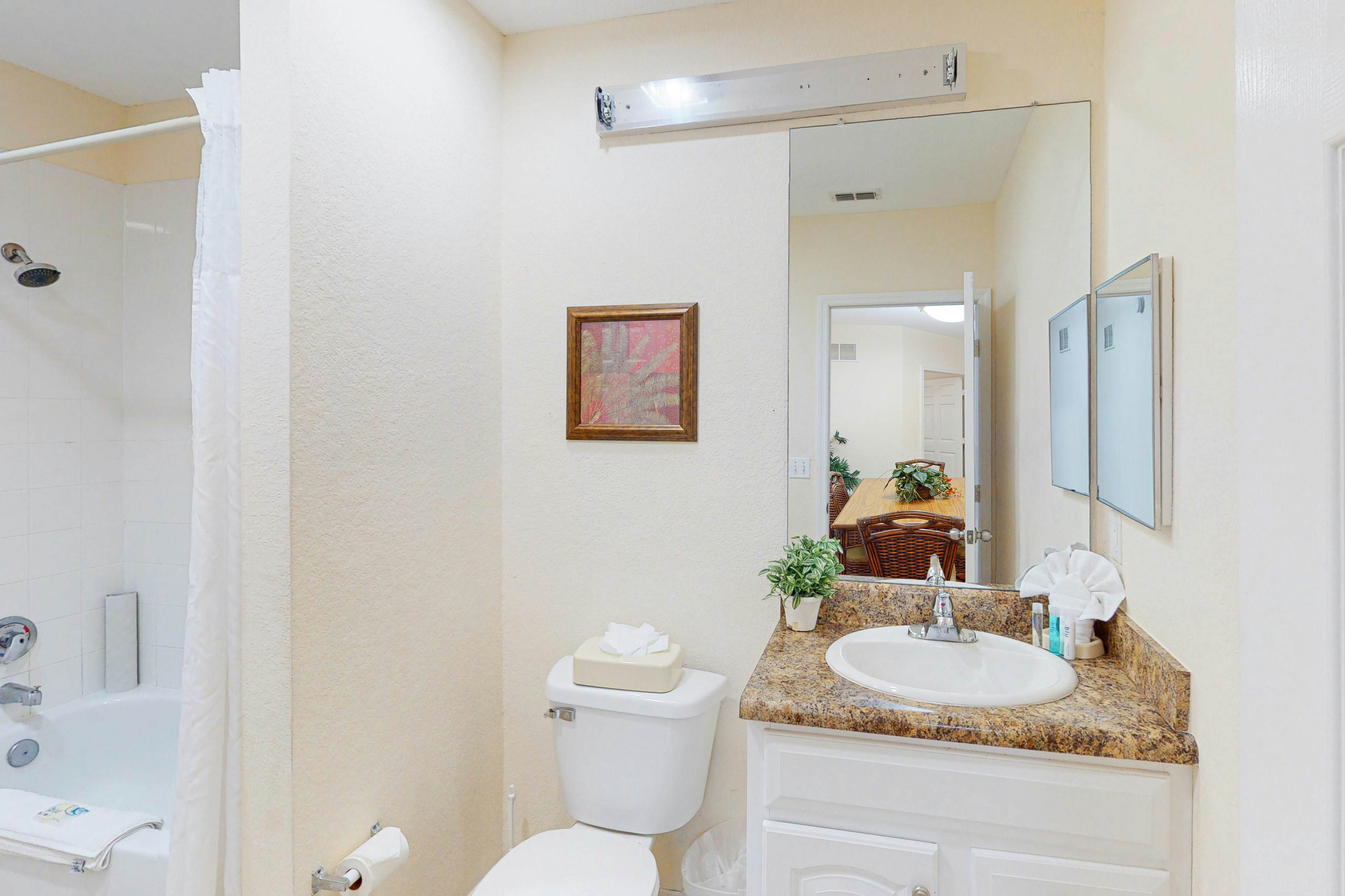 1st floor condo w/ patio, shared pools, gym, limited-mobility access, & sauna