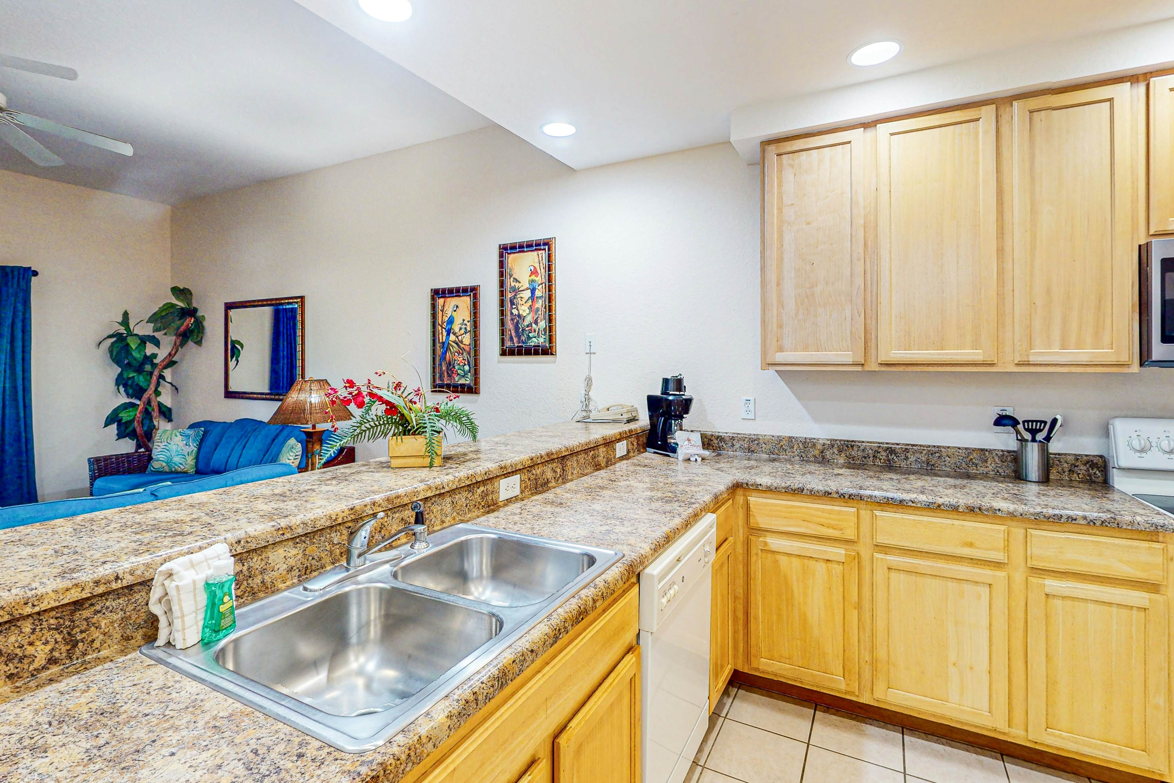 First-floor condo with shared pools, limited-mobility access, sauna, gym, patio