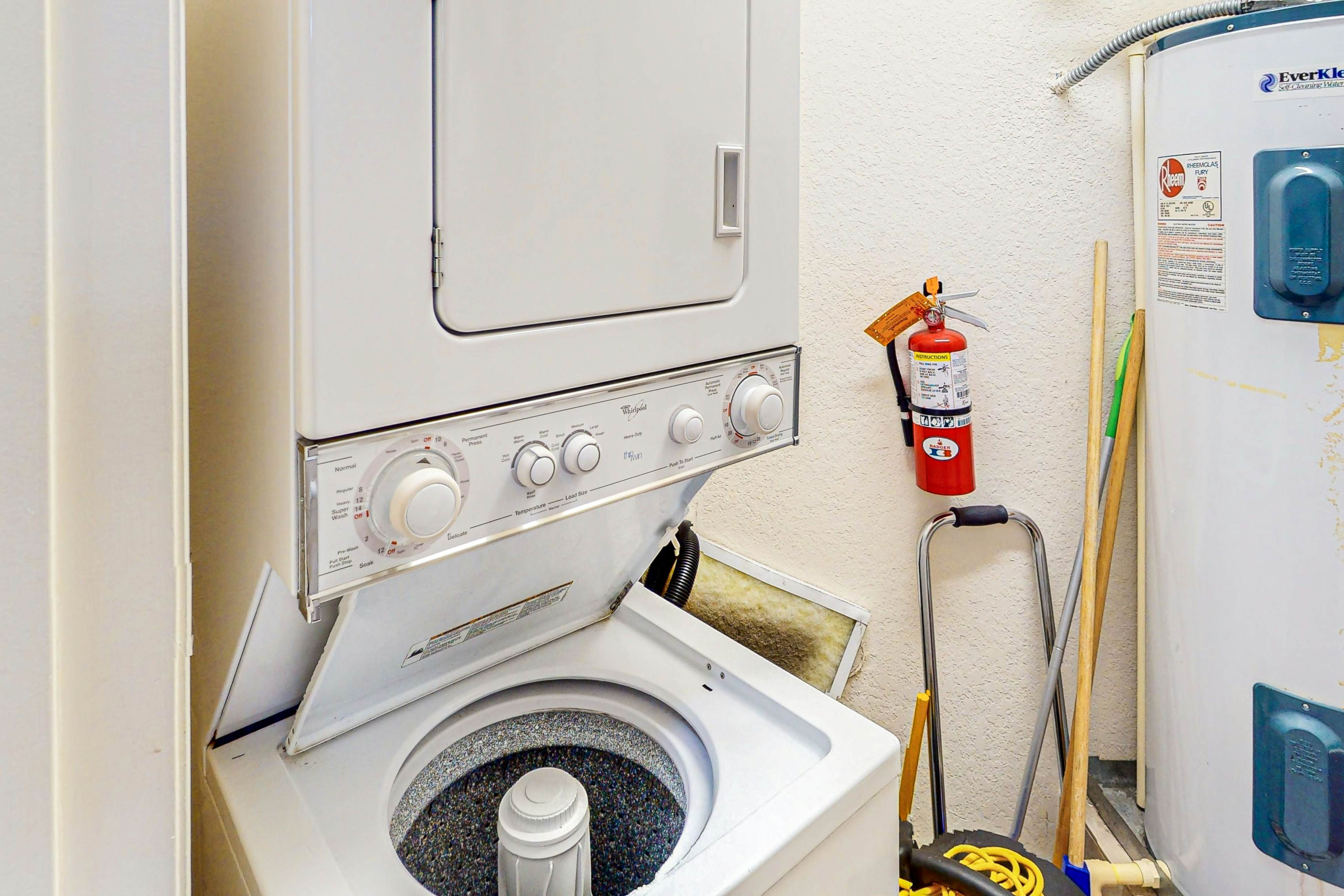 First-floor condo with shared pools, limited-mobility access, sauna, gym, patio