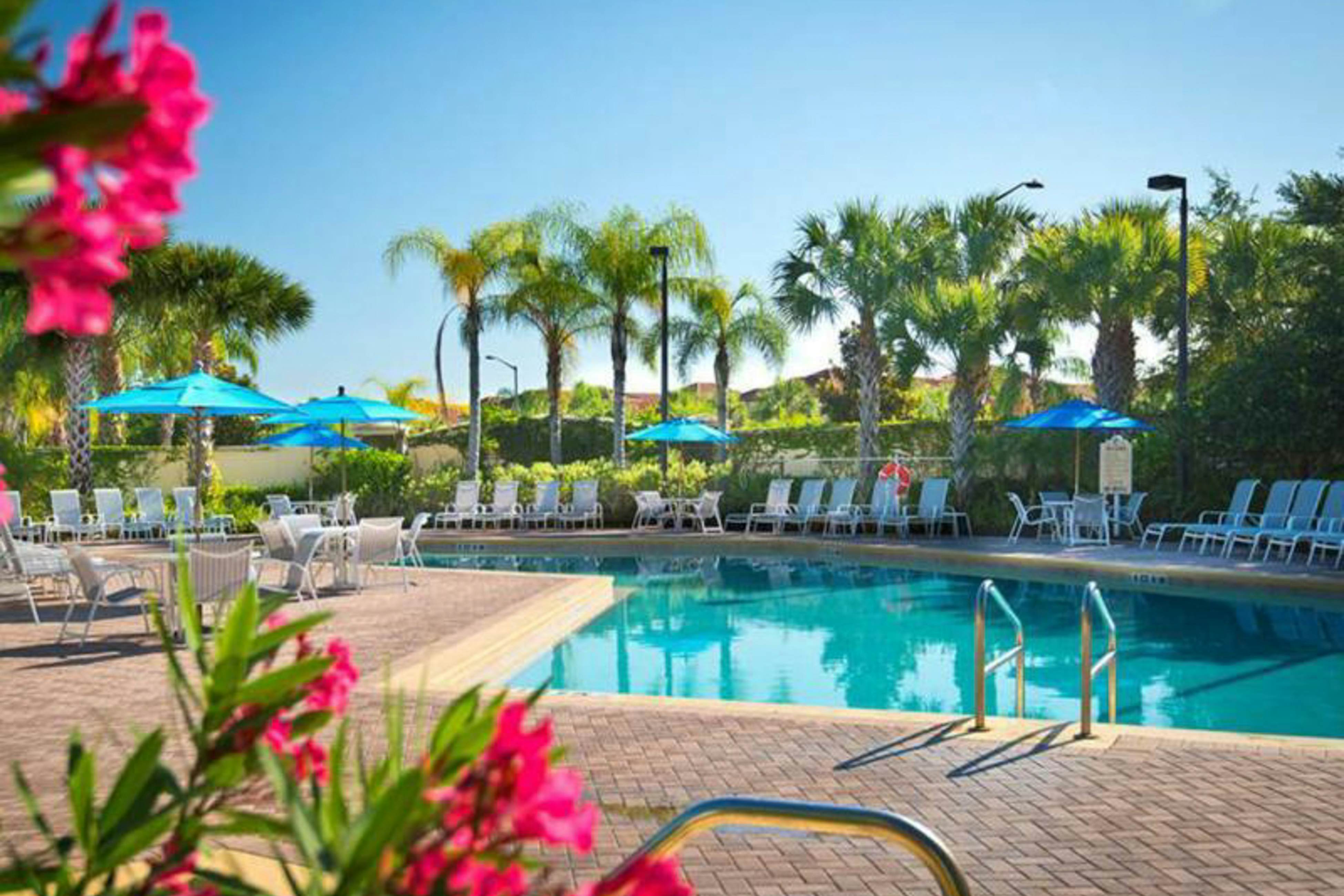 Water view condo with fabulous resort amenities and four TVs - close to Disney 