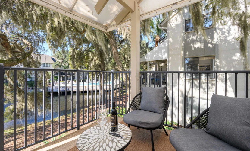 Discover the perfect Hilton Head escape at 36 Springwood Villa. This modern 3BR retreat is just a 10-minute walk from the iconic Coligny Beach and the vibrant shops of Coligny Plaza. Relax by the community pool or enjoy coffee on your private balcony overlooking lush gardens. With space for 8 and a fully equipped kitchen, it’s designed for effortless family vacations.