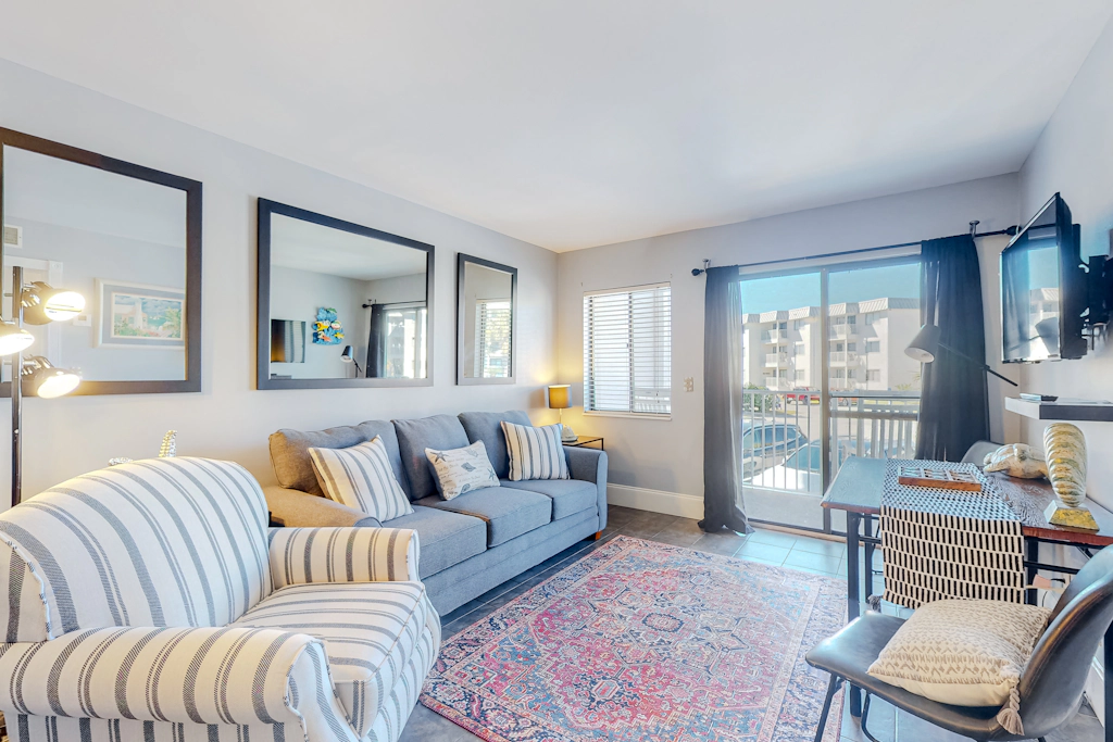 Ocean-view condo near the beach with indoor pool, gym, & basketball