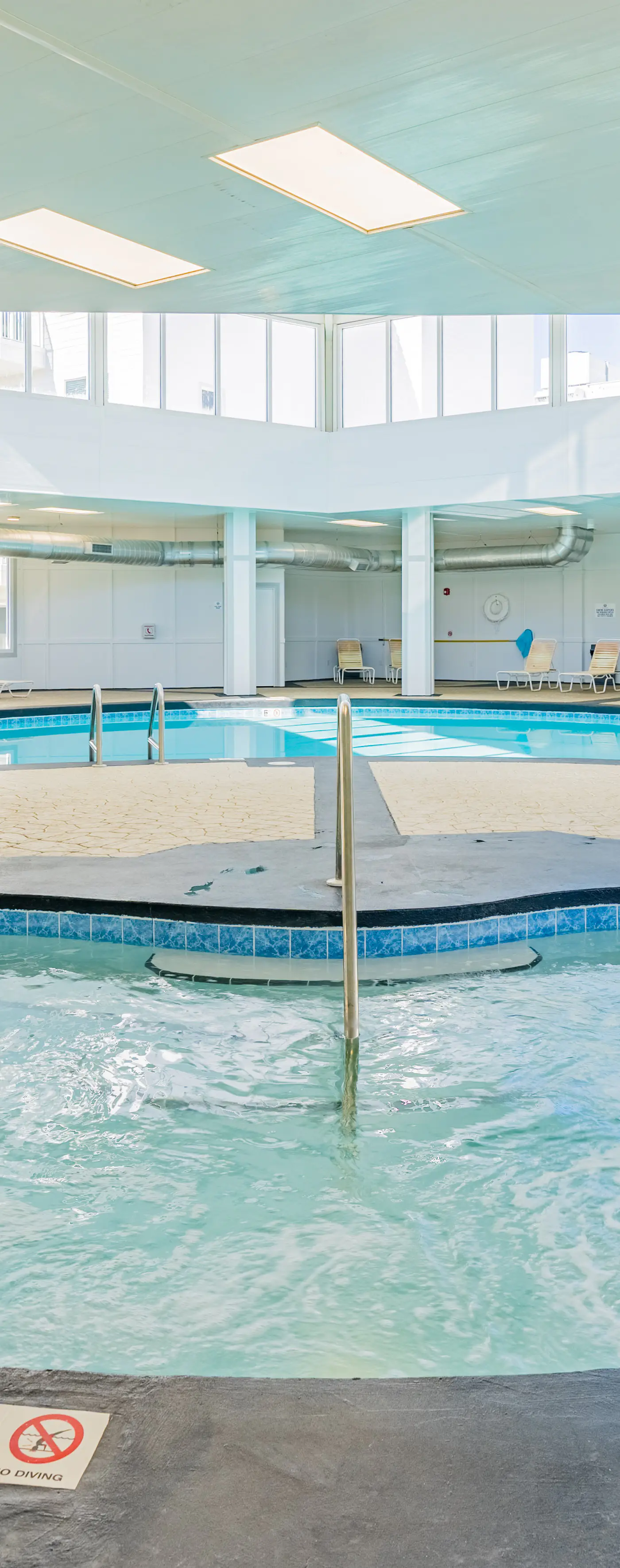 Ocean-view condo near the beach with indoor pool, gym, & basketball