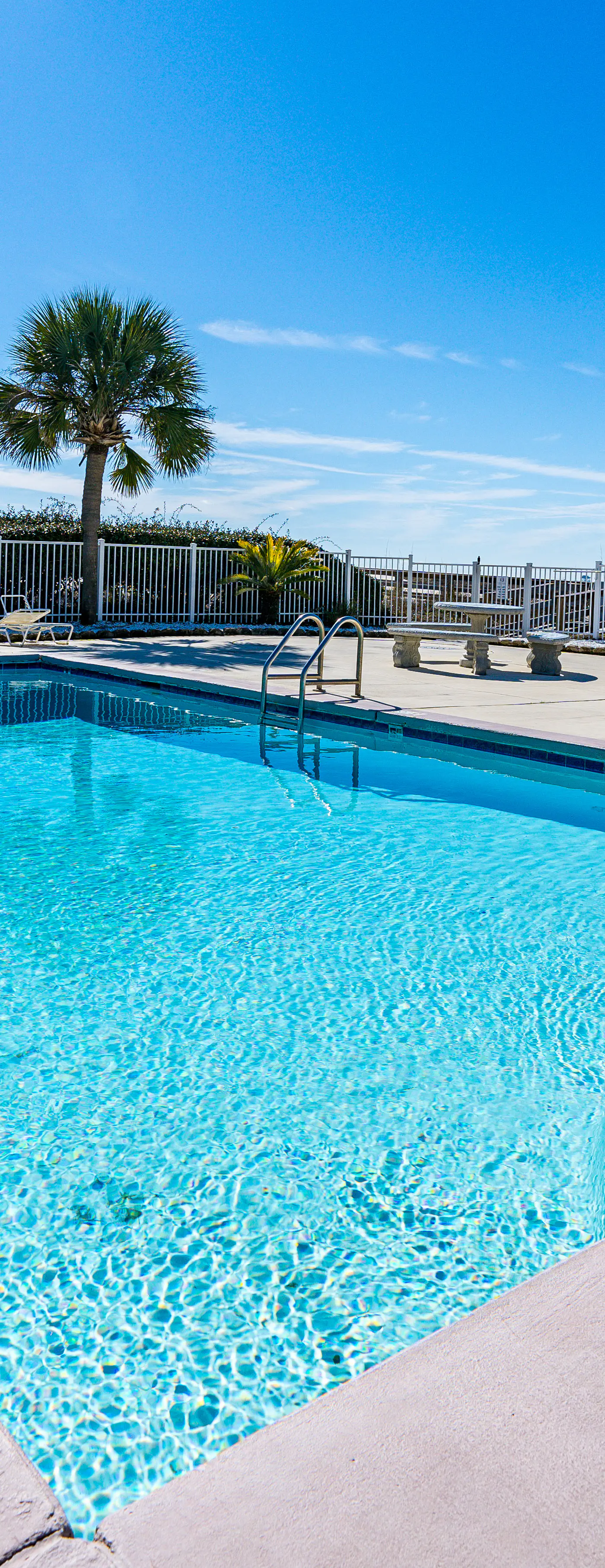 Ocean-view condo near the beach with indoor pool, gym, & basketball