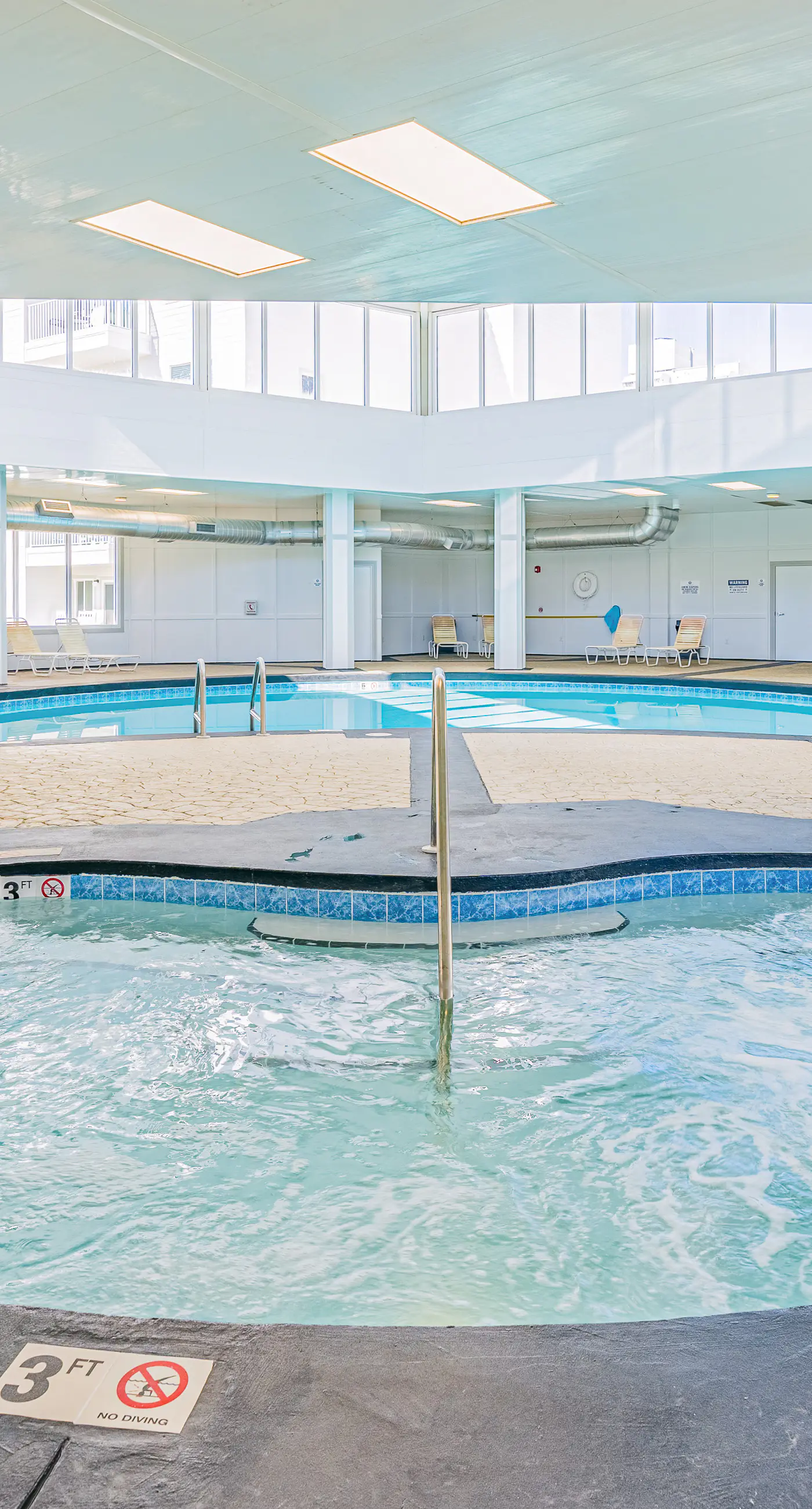 Waterfront getaway with beach view, shared pools & sports courts