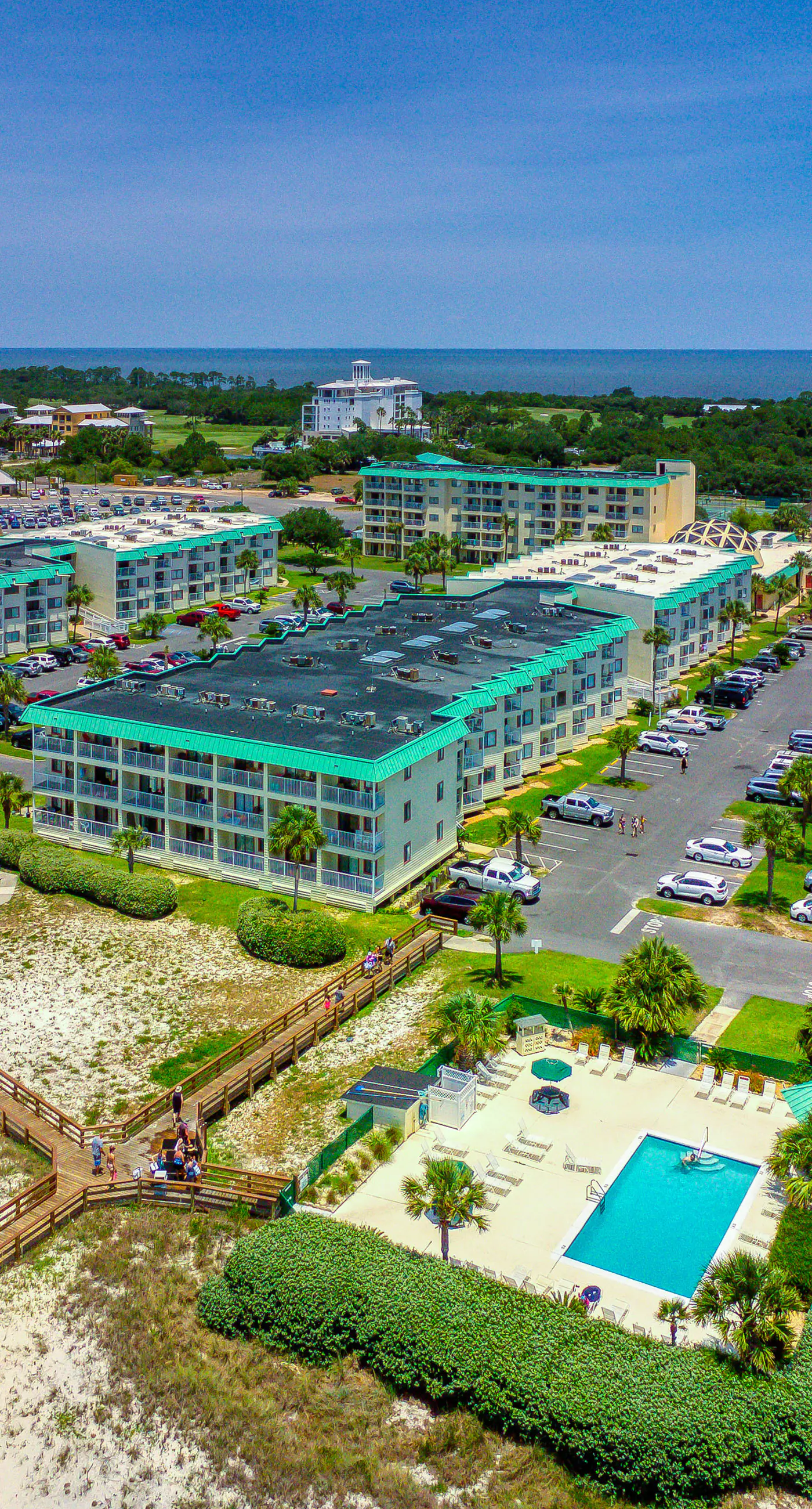 Waterfront getaway with beach view, shared pools & sports courts