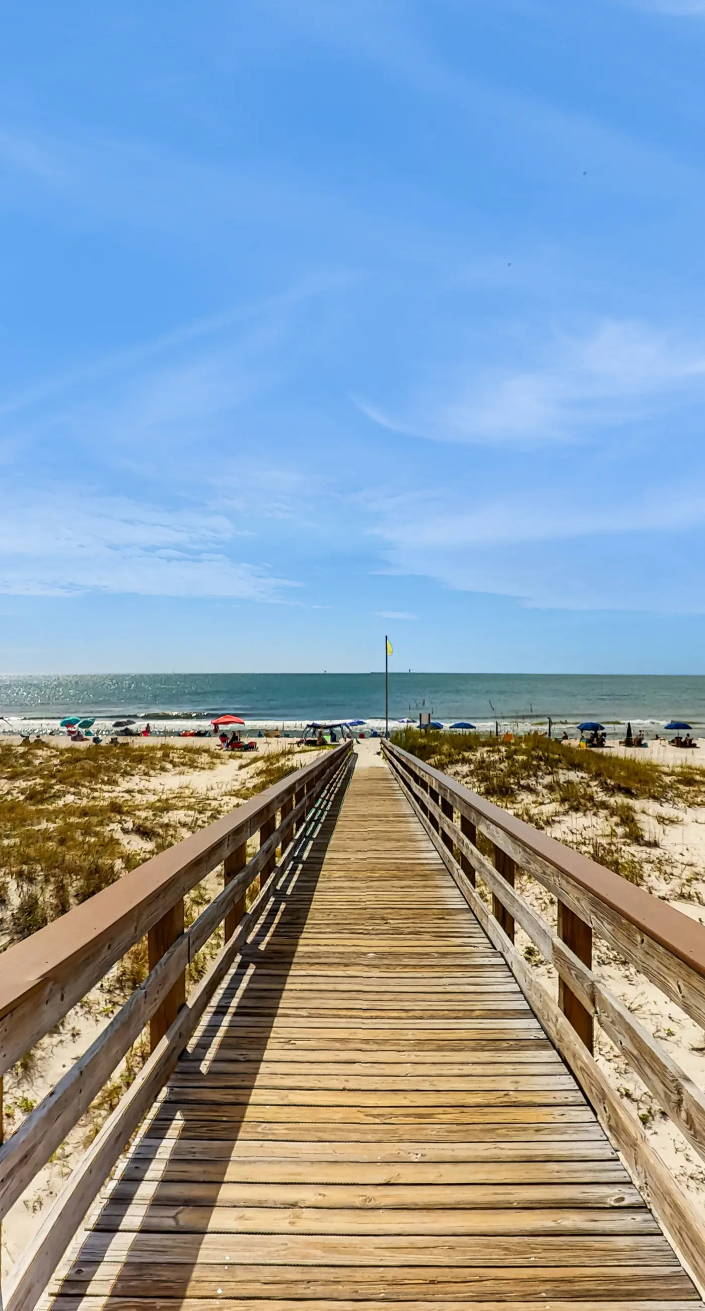 Waterfront getaway with beach view, shared pools & sports courts