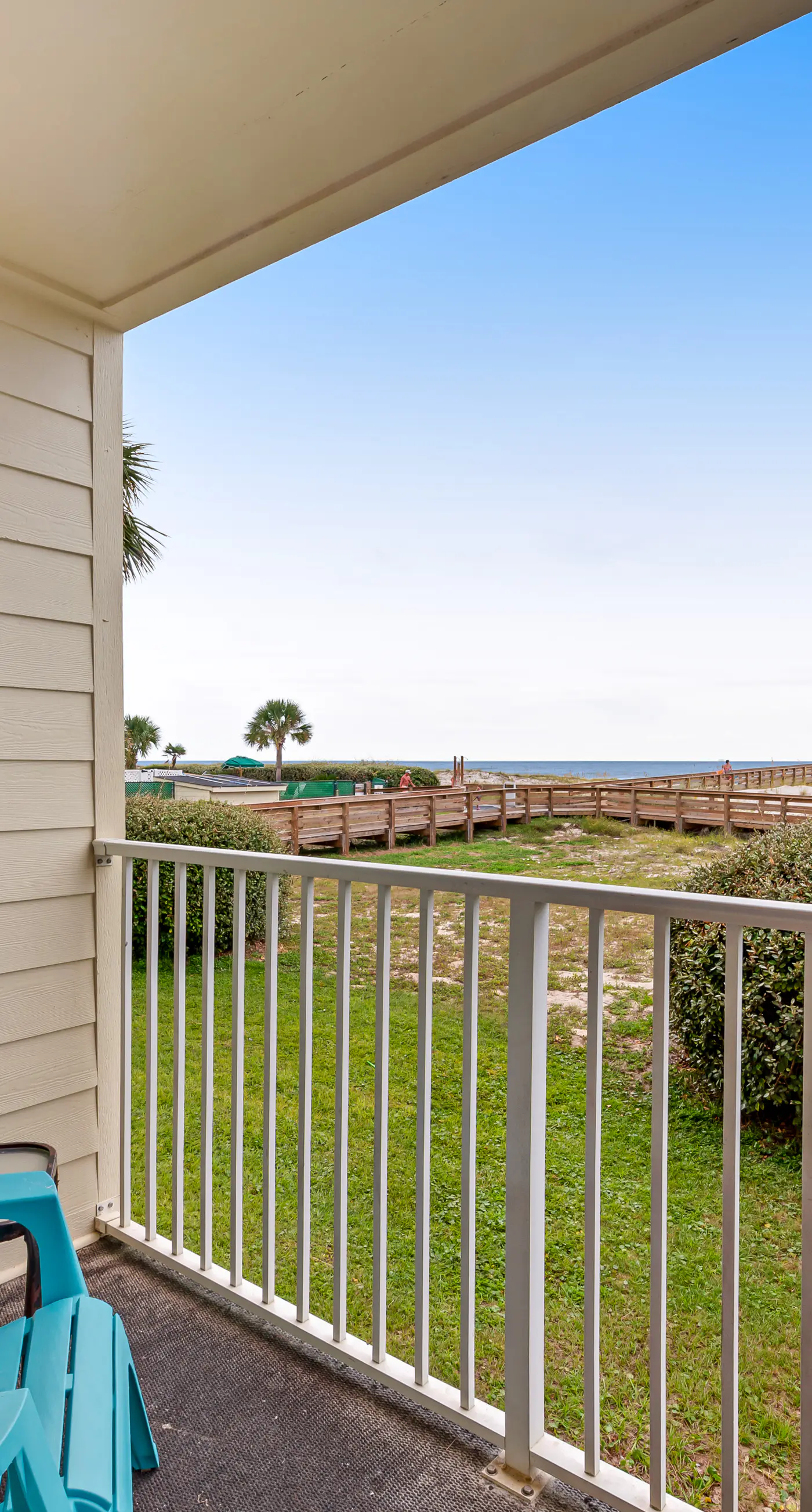 Beachfront condo with balcony, shared pool