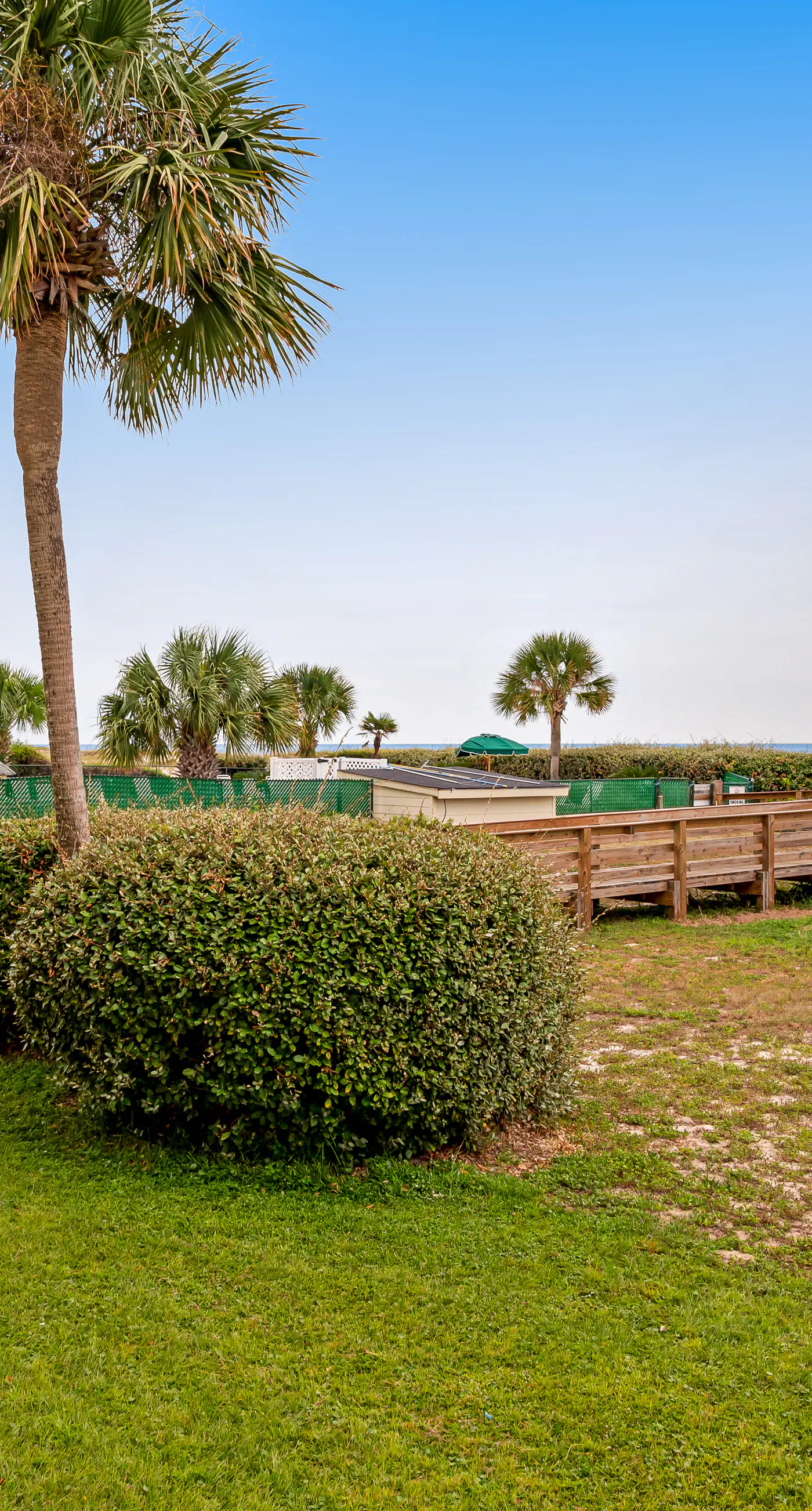 Beachfront condo with balcony, shared pool