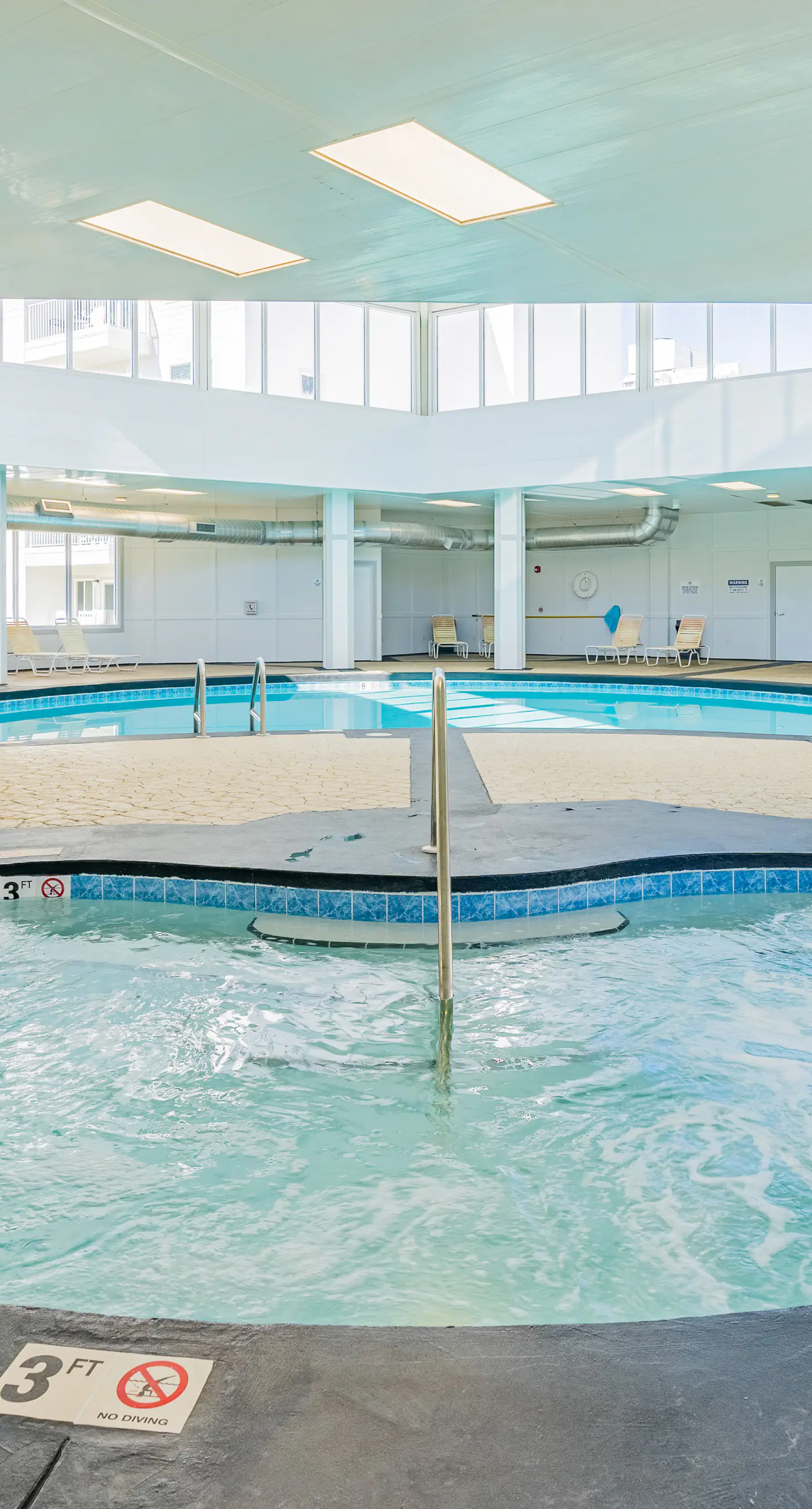 Beachfront condo with balcony, shared pool