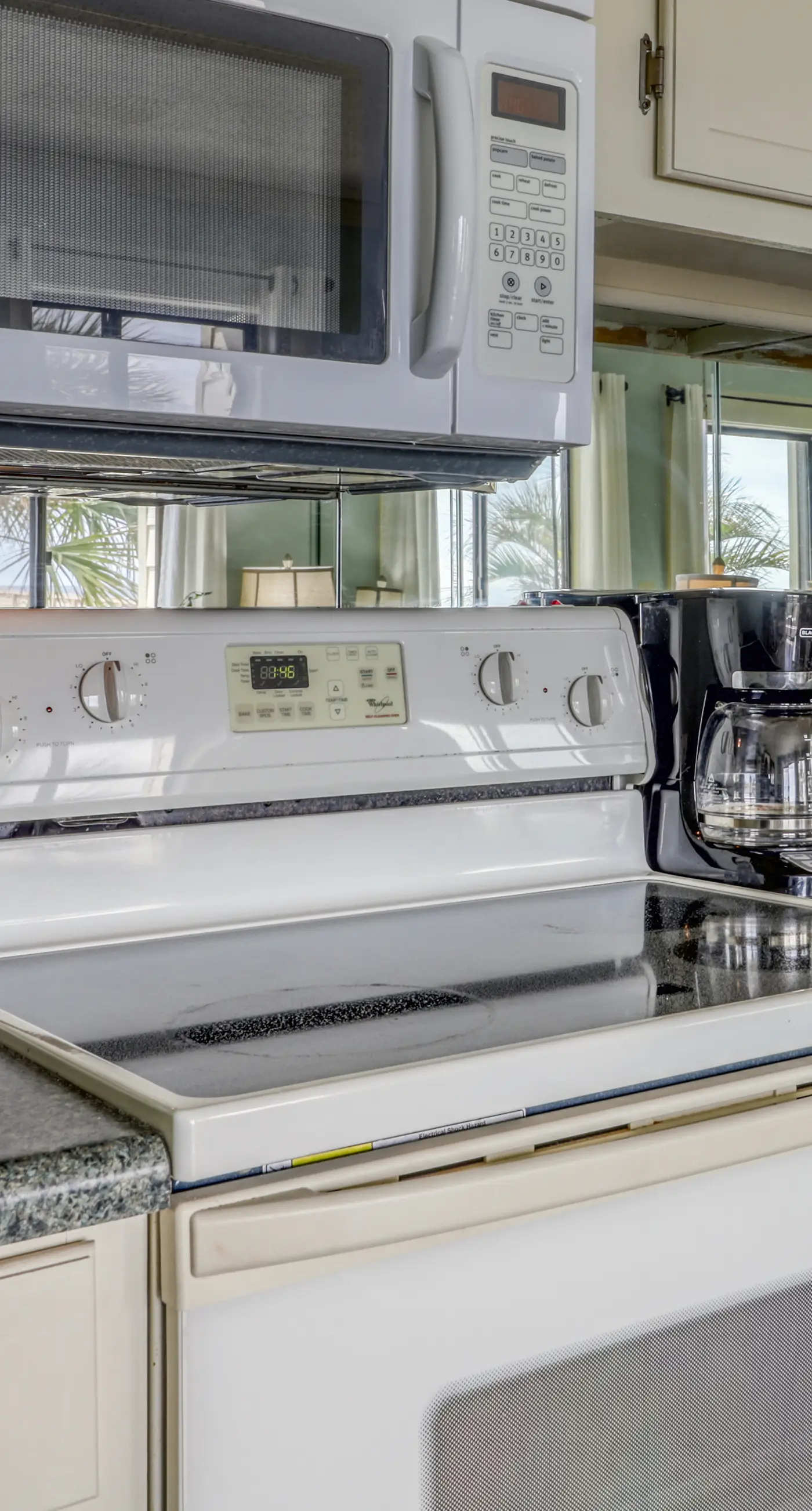 Waterfront condo with balcony and Gulf view plus shared pool