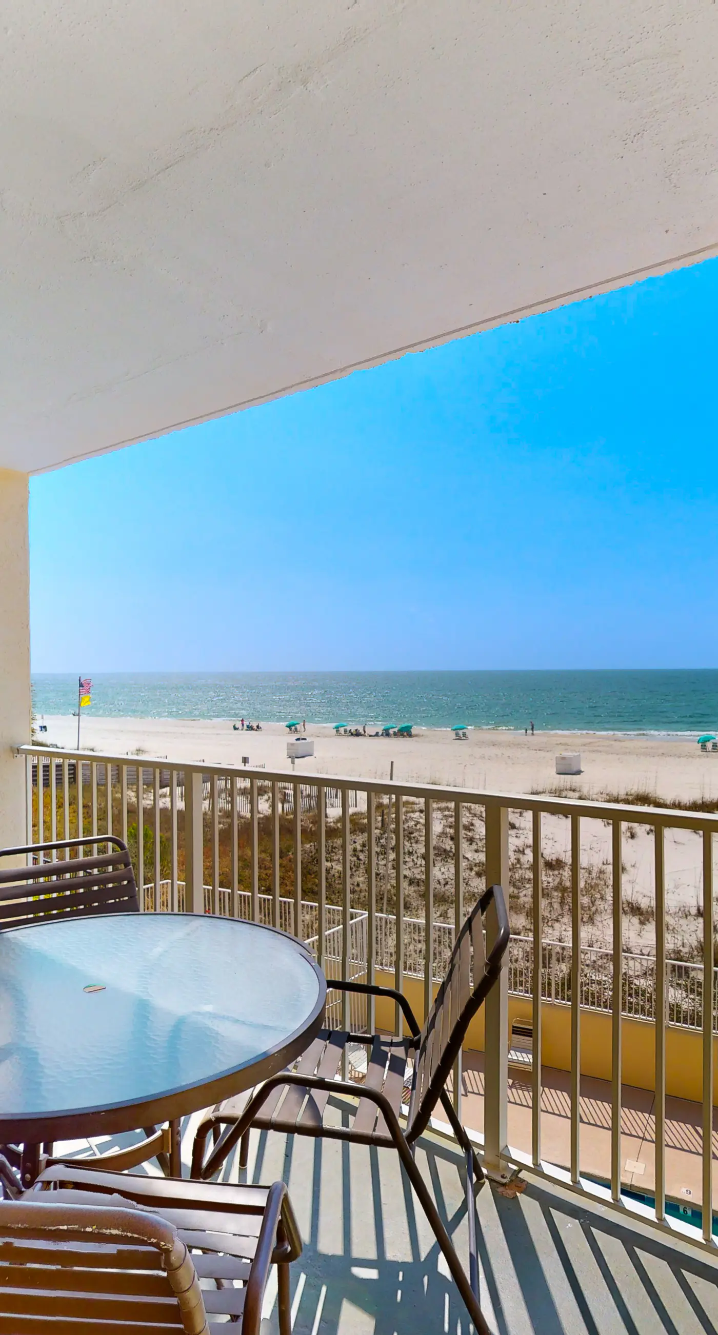 2nd-floor Gulf-front condo with amazing beach views, balcony, outdoor pool & W/D