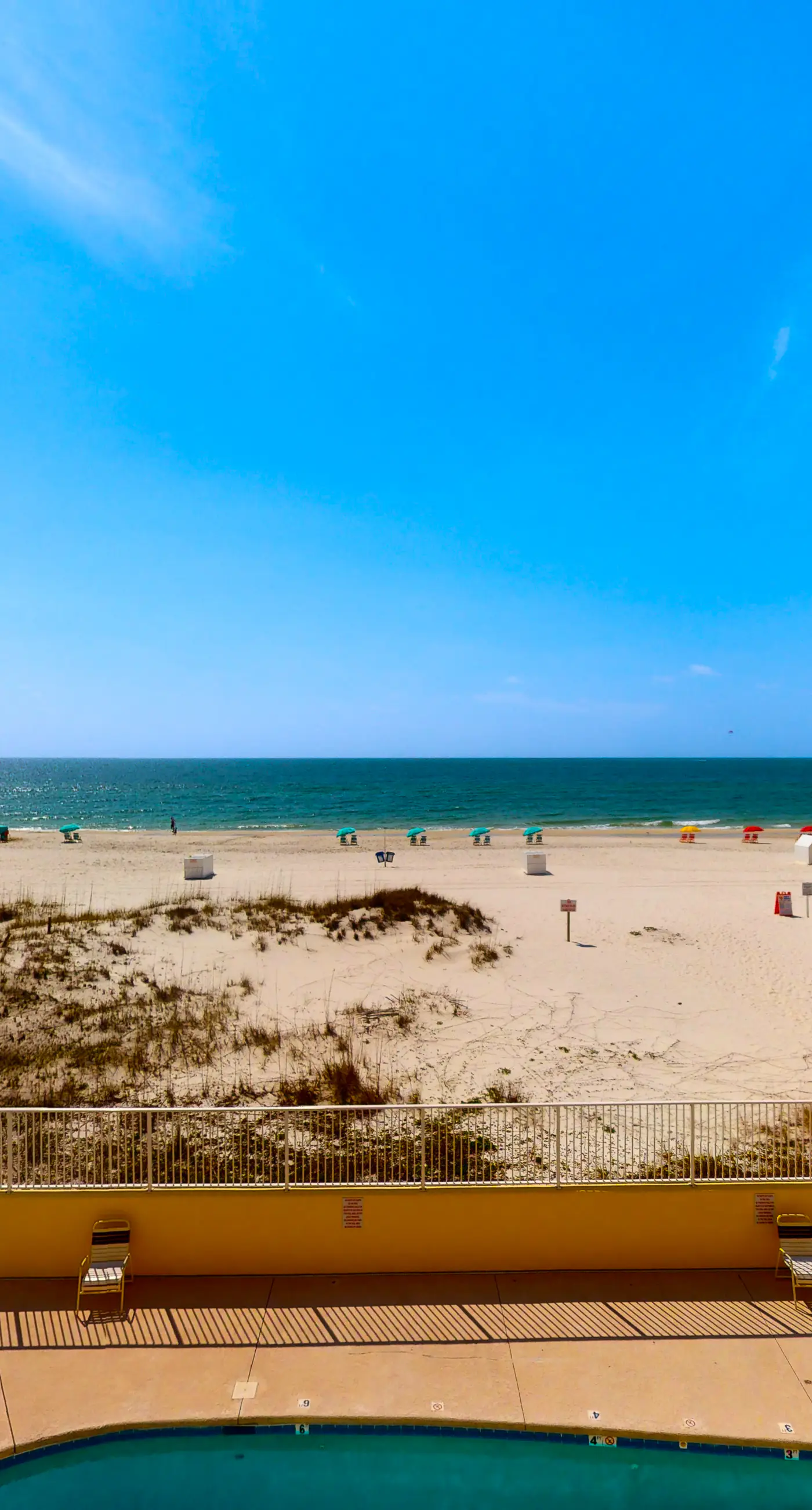 2nd-floor Gulf-front condo with amazing beach views, balcony, outdoor pool & W/D