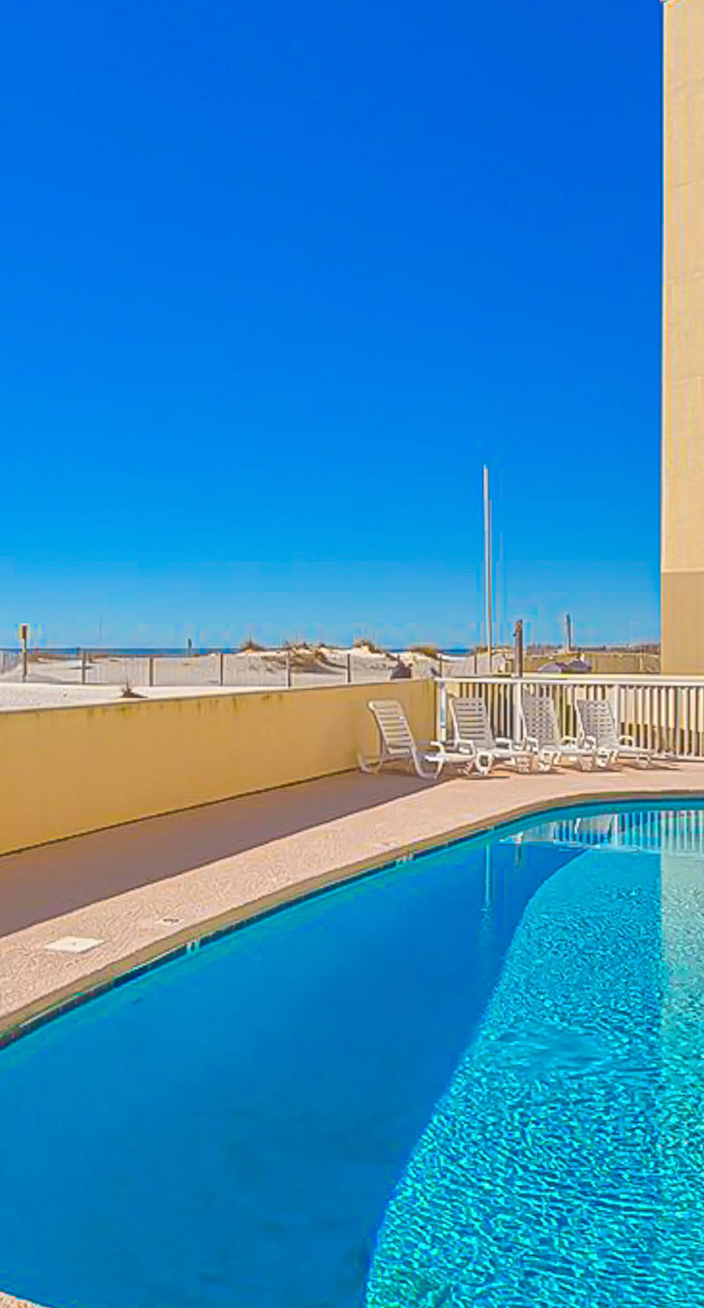 2nd-floor Gulf-front condo with amazing beach views, balcony, outdoor pool & W/D