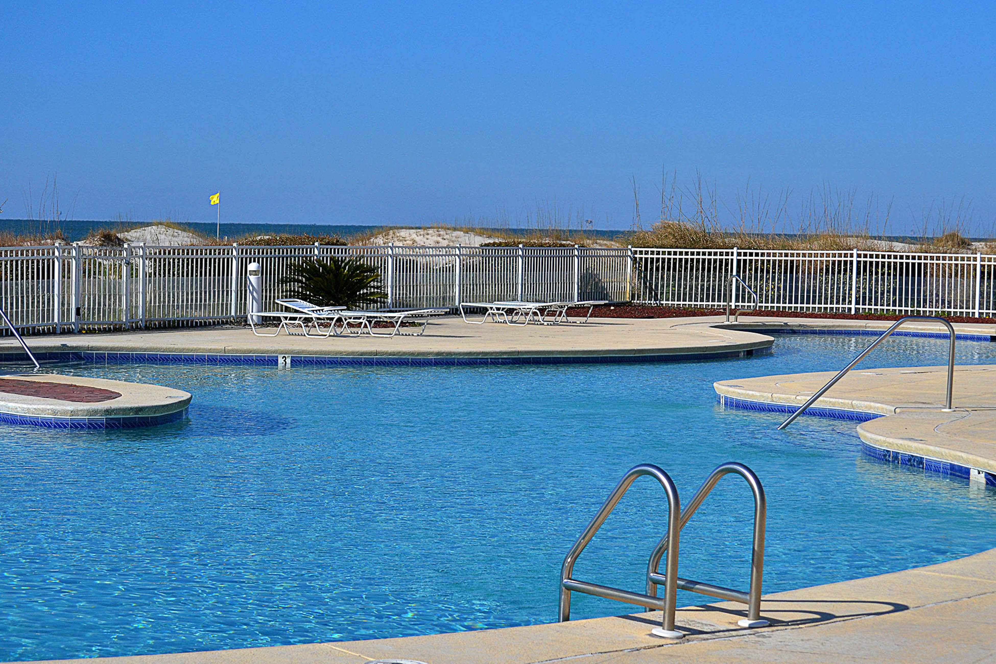 Contemporary beachside escape with gym, & pools