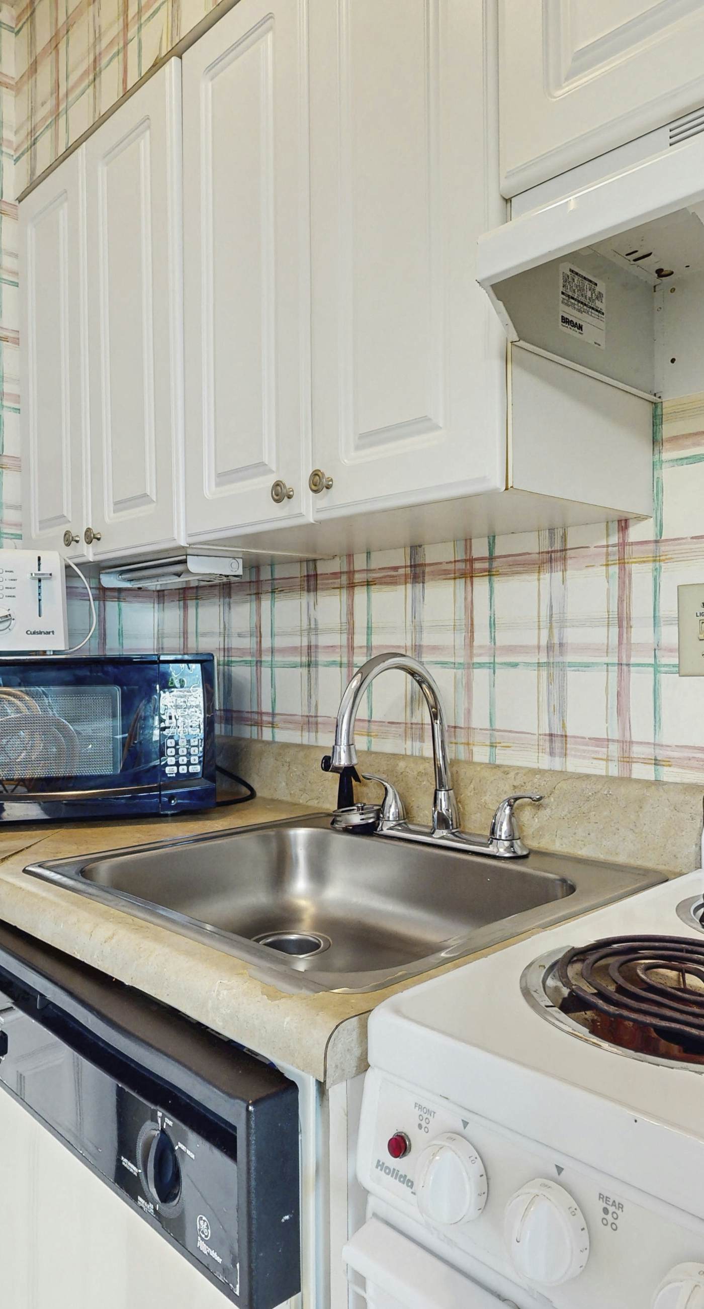 Contemporary beachside escape with gym, & pools