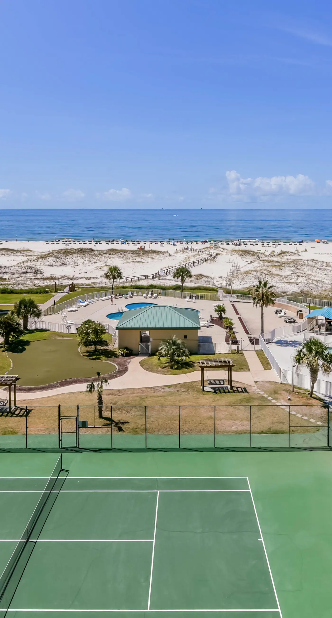 Waterfront condo with shared pool & hot tub - walk to the beach