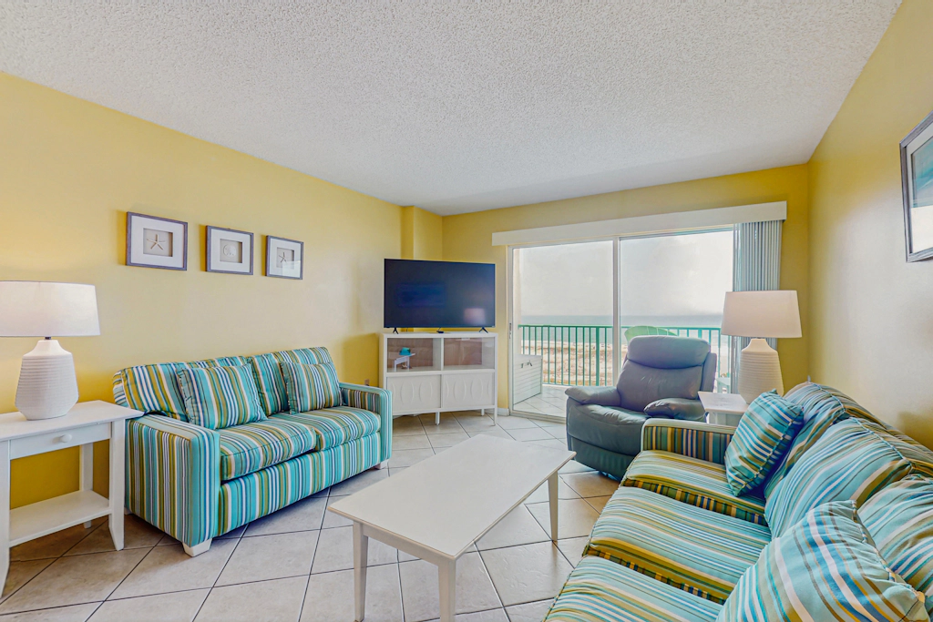 Beachfront condo with balcony, Gulf views, pools, gym, & game room at Plantation Palms