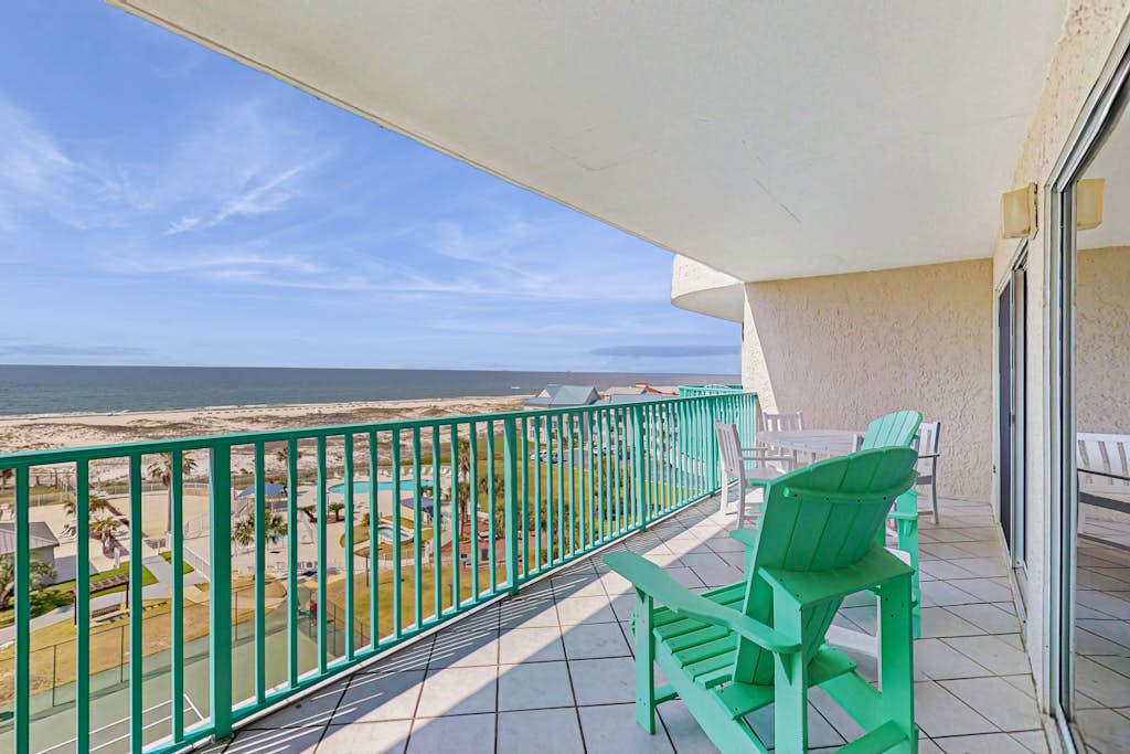 Beachfront condo with balcony, Gulf views, pools, gym, & game room at Plantation Palms